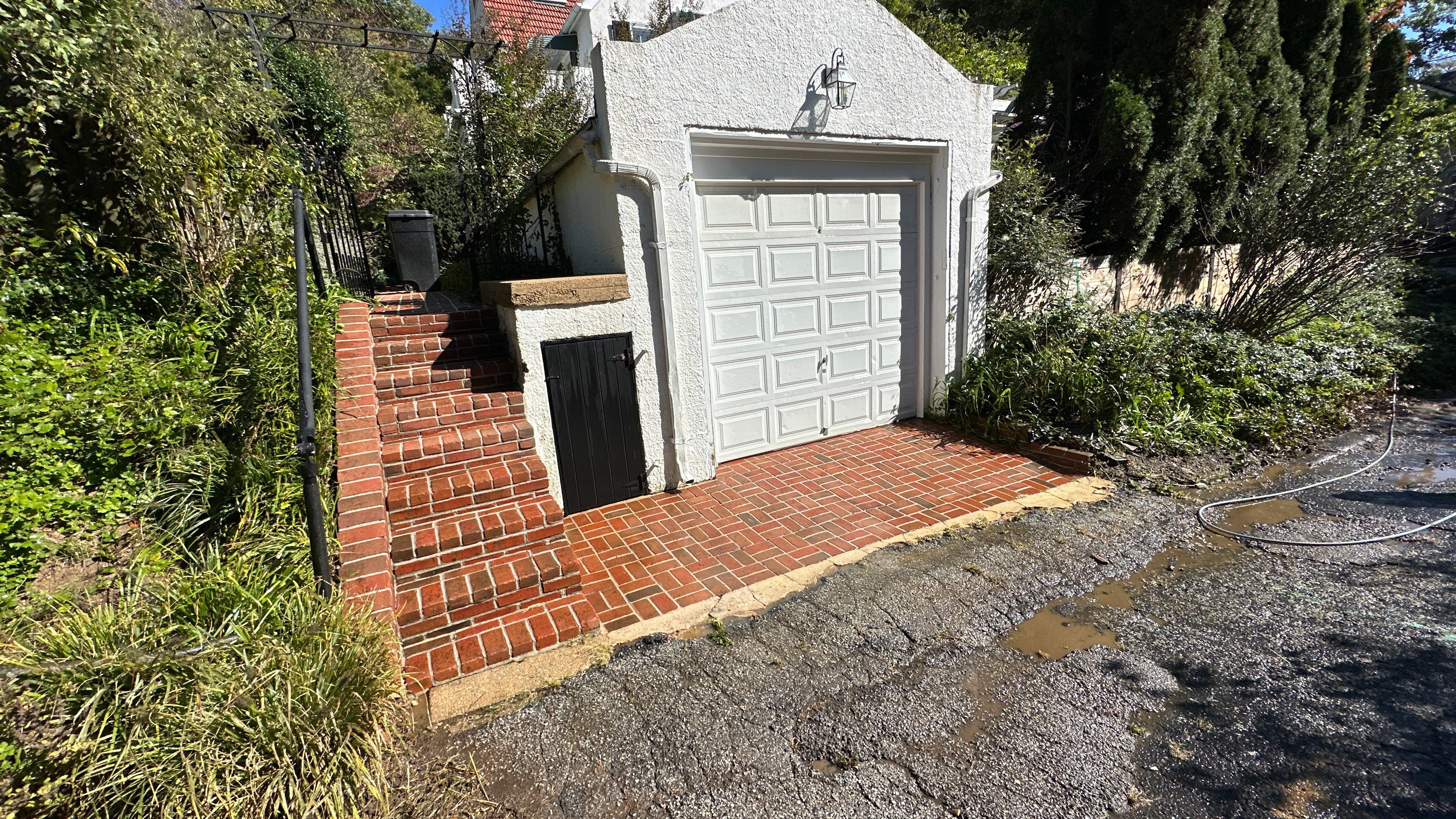 Stucco House Washing and Concrete Balcony Cleaning in Baltimore by Baltimore Pressure Washers Inc.