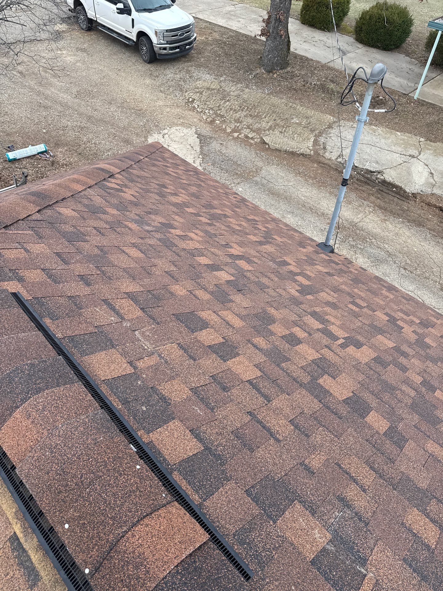 Rustic Hickory Shingles & SBS Cap & Base by In & Out Construction & Remodeling, LLC