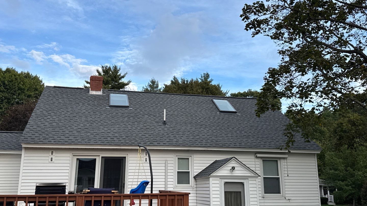 Complete Roof Replacement with GAF Pewter Gray HDZ™ Shingles, VELUX Skylights & New Gutters by Sensible Home Solutions