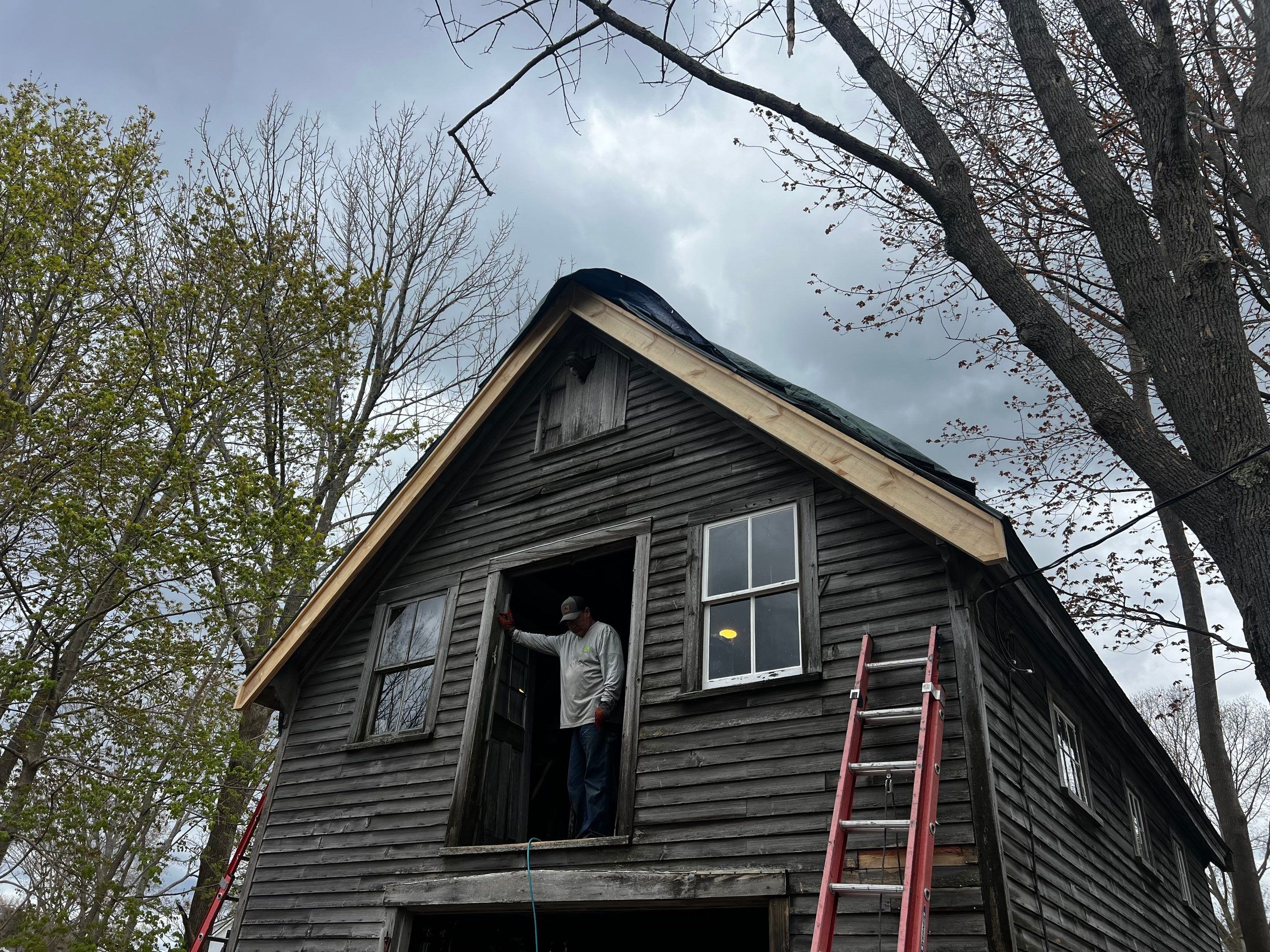 Just the beginning of a barn restoration in New Castle by Tall pine roofing