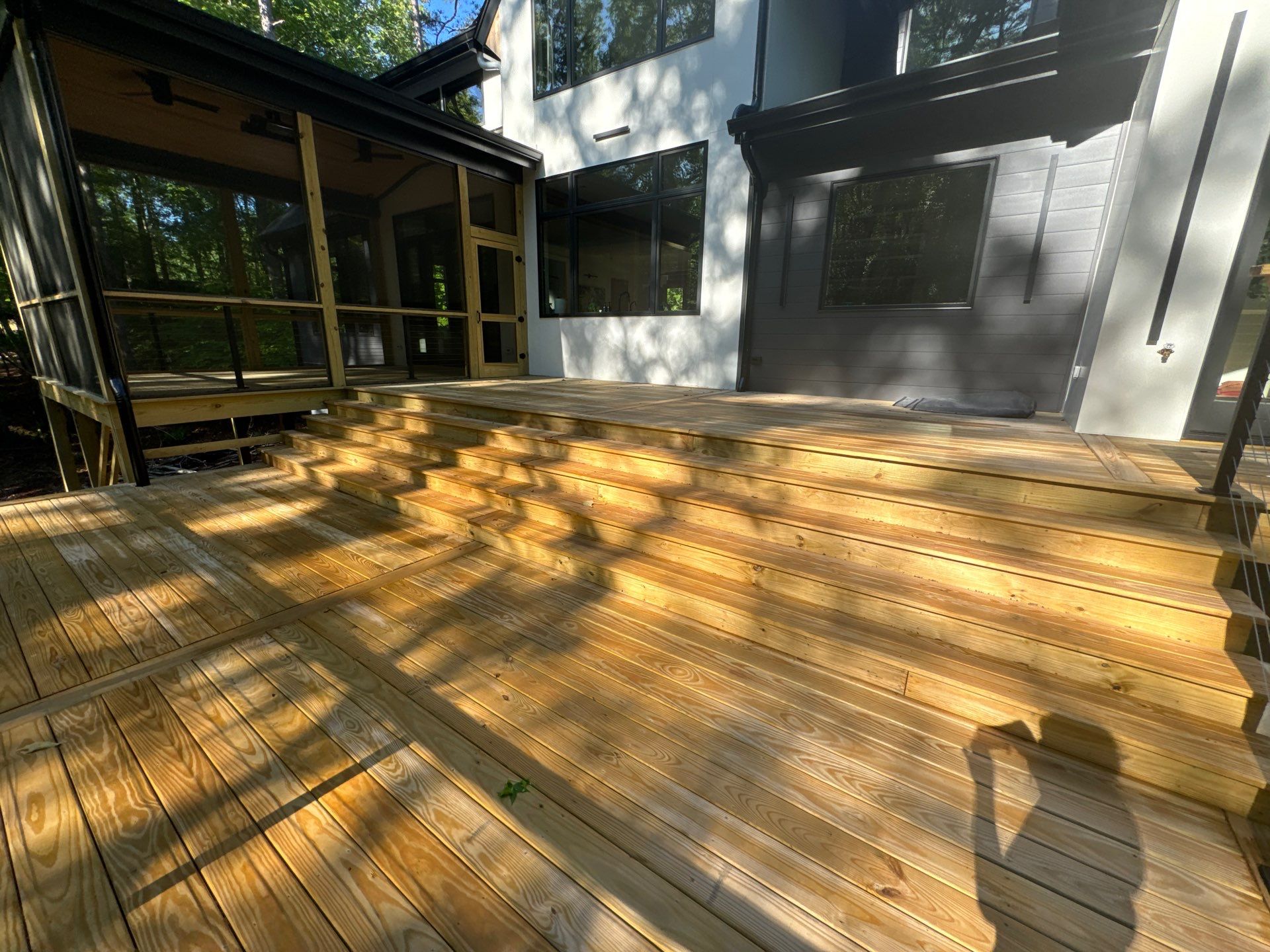 Porch and Deck staining  by GonzalezPainters & Contractors Inc 