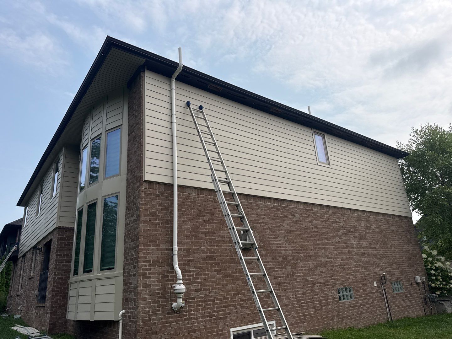 Siding Replacement using Alside S7 Cedar Mill Grain Composite by 180 Contractors