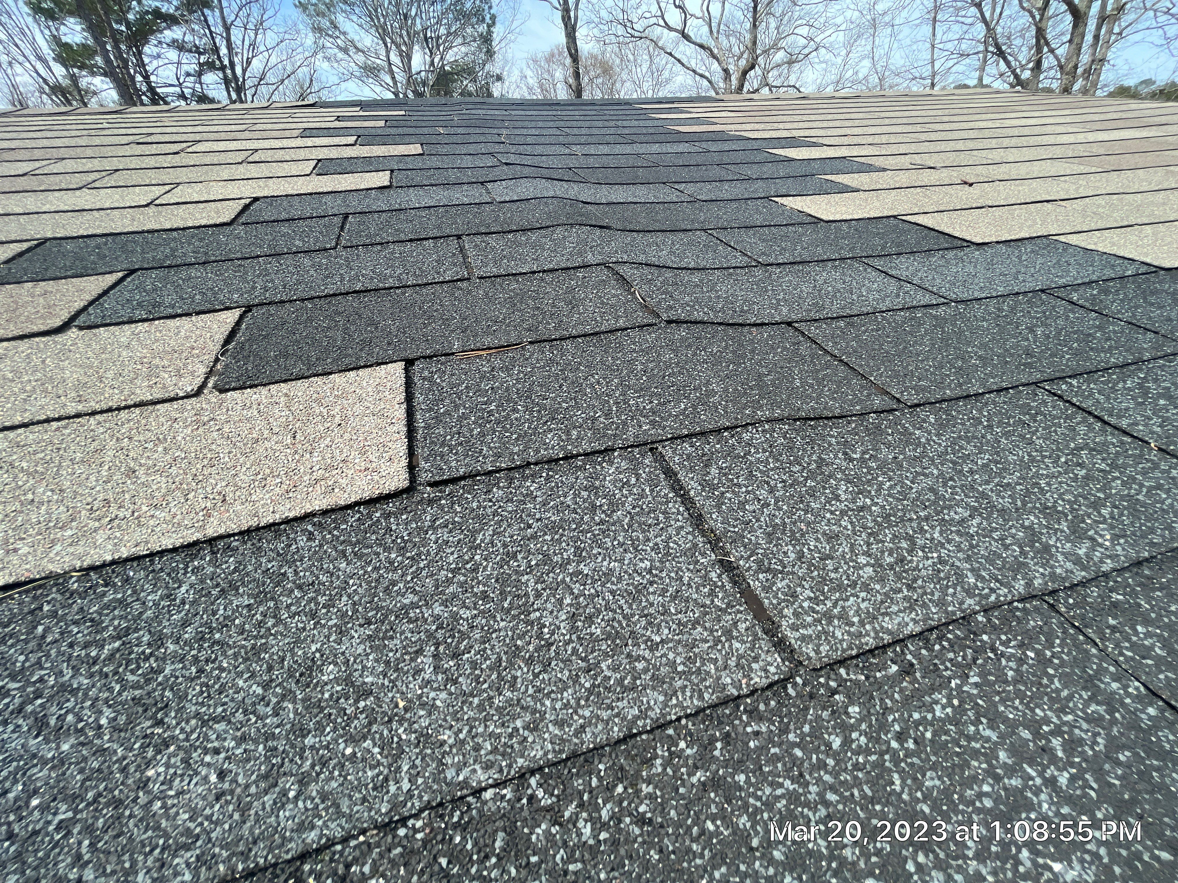 Residential Roofing Installation using 26 Gauge Colored Panels by Hostetler Roofing