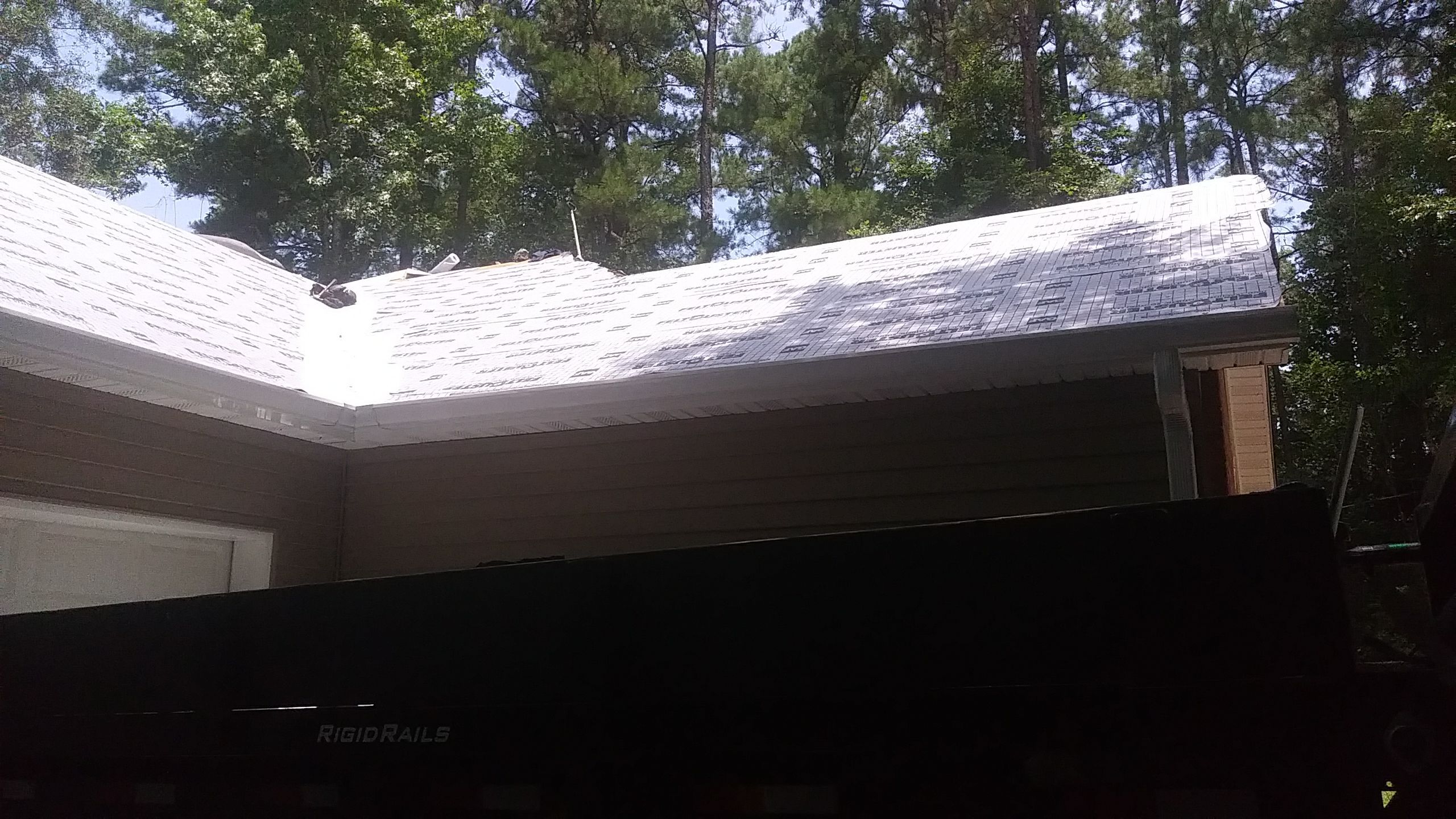 Residential Roofing Installation using Roof Replacement by American Roofing & Construction LLC