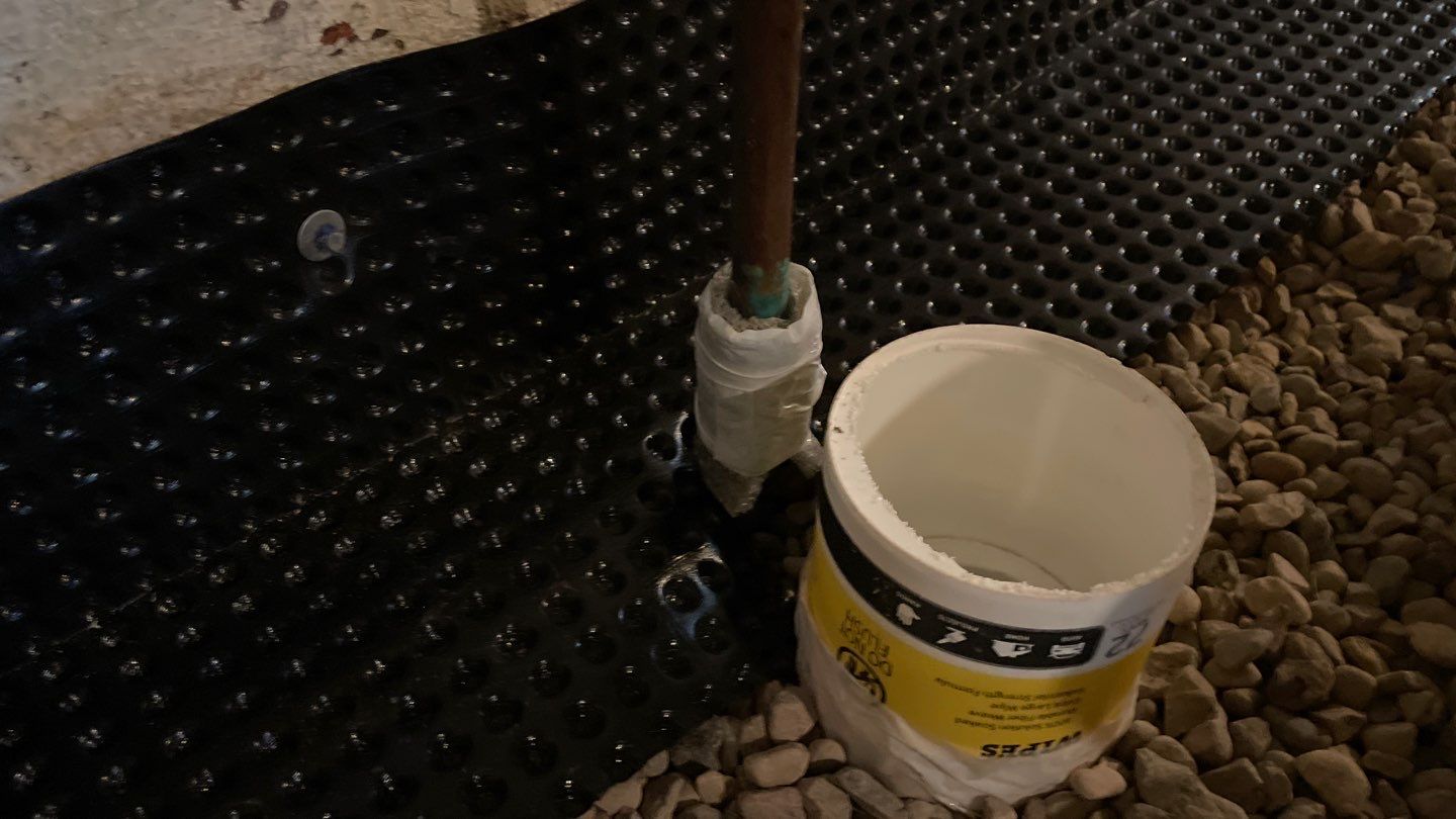 Interior Drain Tile & Sump Pump System in North Minneapolis by Waterproofing Northeast