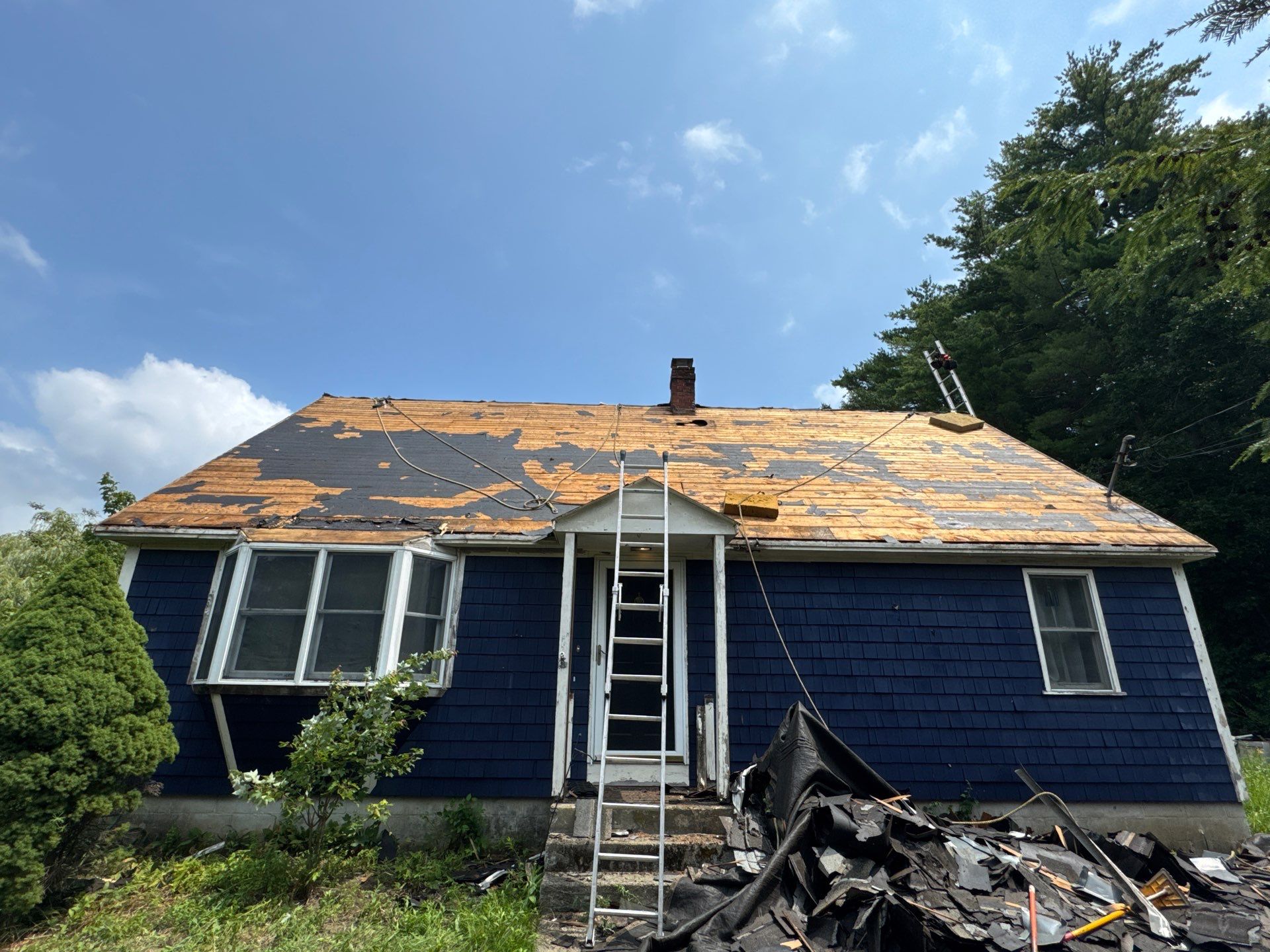 Roof Replacement Near the YMCA in Exeter, NH | Owens Corning Onyx Black by Compass exteriors