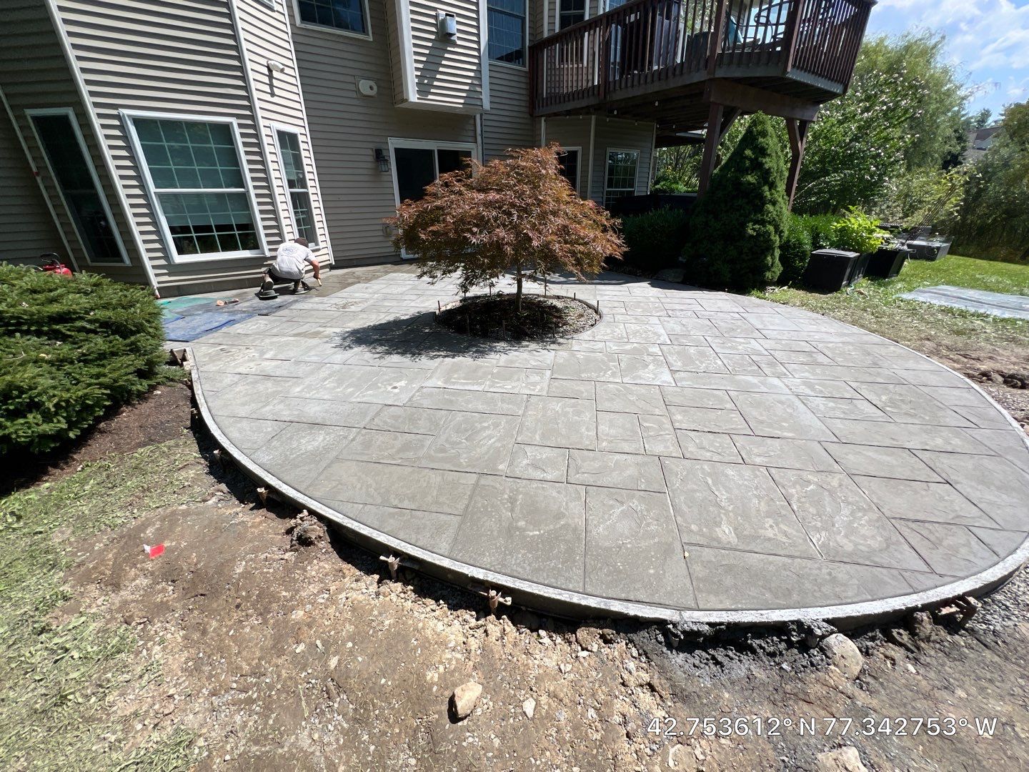 Majestic ashlar stamped concrete patio  by NG Masonry & Construction LLC