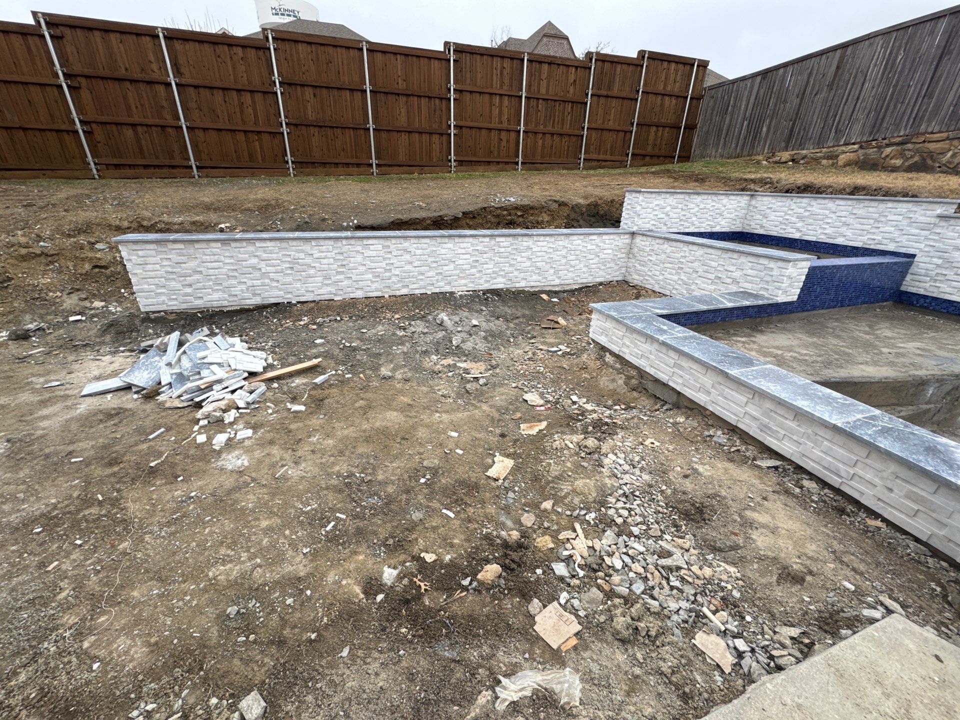 Geometric Pool with Raised Spa and Tile Spillway by Pinnacle Pools and Spas - DFW