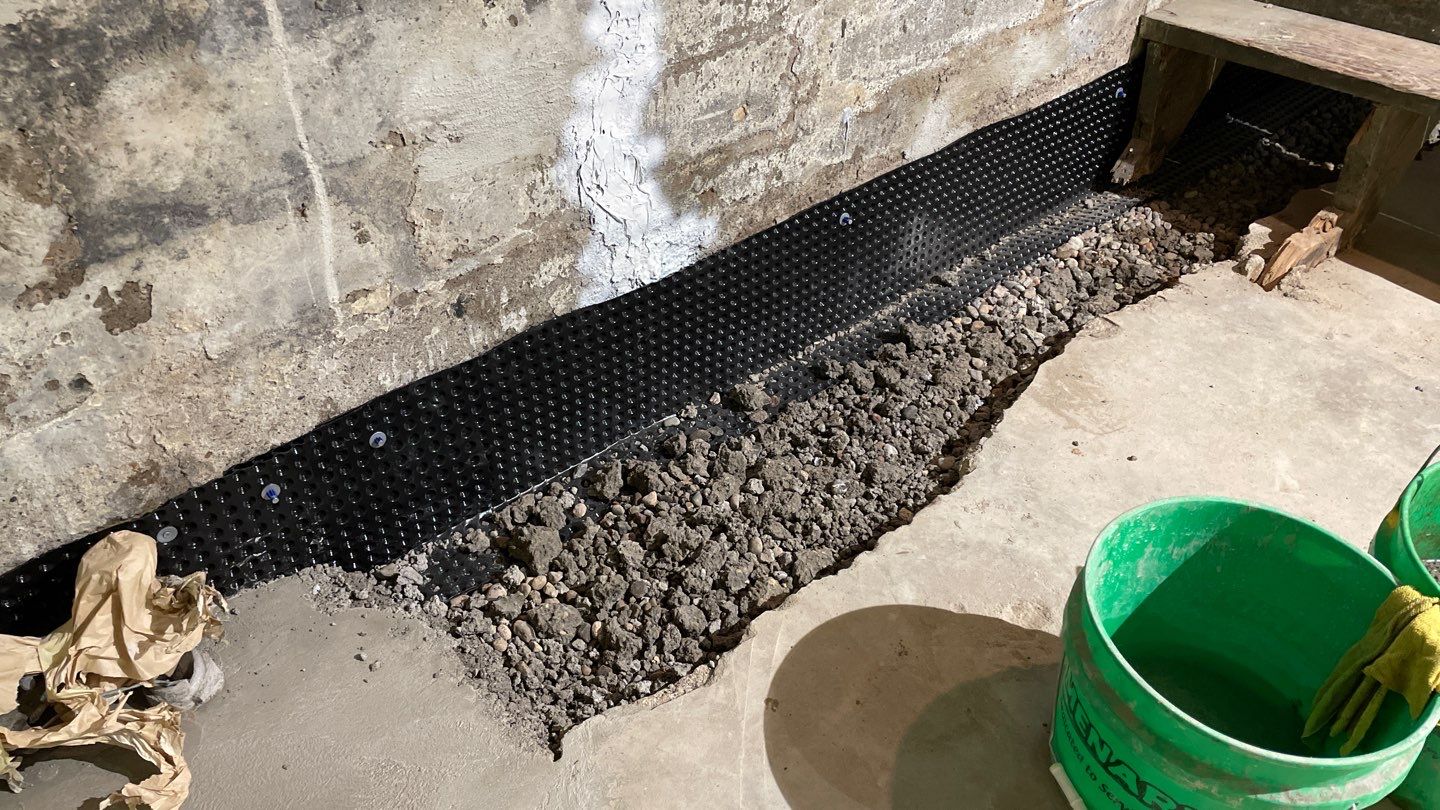 Interior Drain Tile & Foundation Crack Repair in Northeast Minneapolis by Waterproofing Northeast