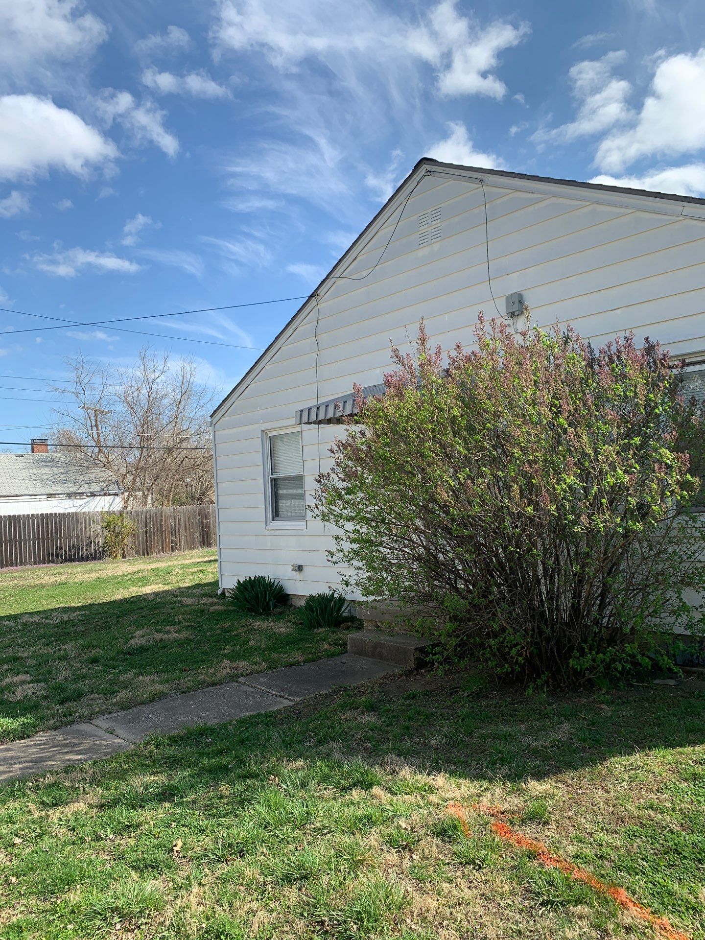 New Cypress Siding going on this North Kansas City Home  by EEC  Windows, Siding & Roofing 