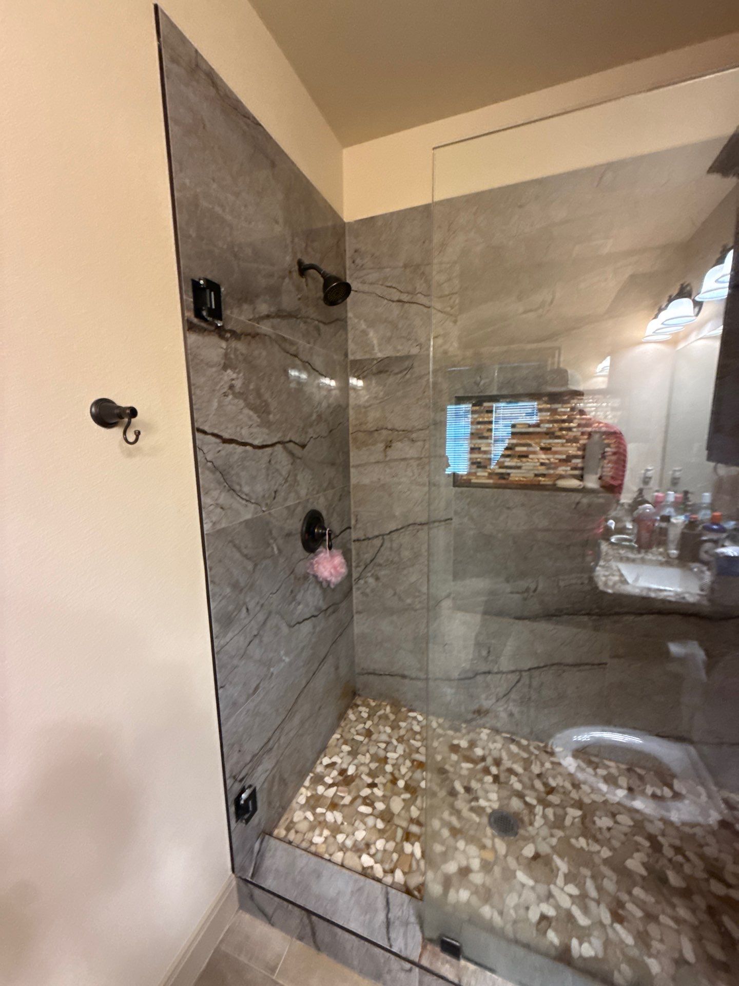 Broekn Shower door replacement by Richardson Glass & Mirror