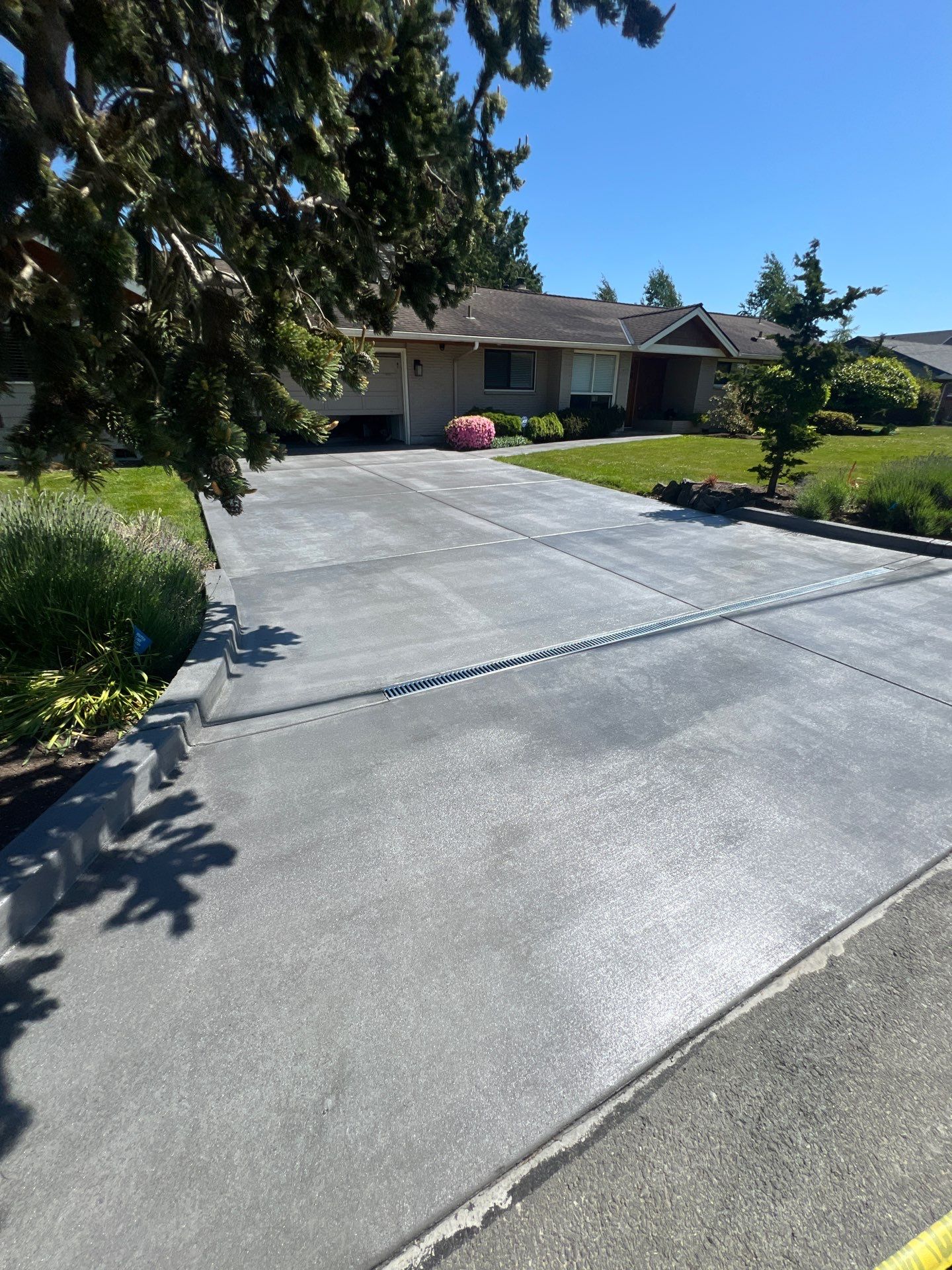 Colored Concrete Driveway Repair with Sealer| Everett    by Jireh Asphalt & Concrete Inc 