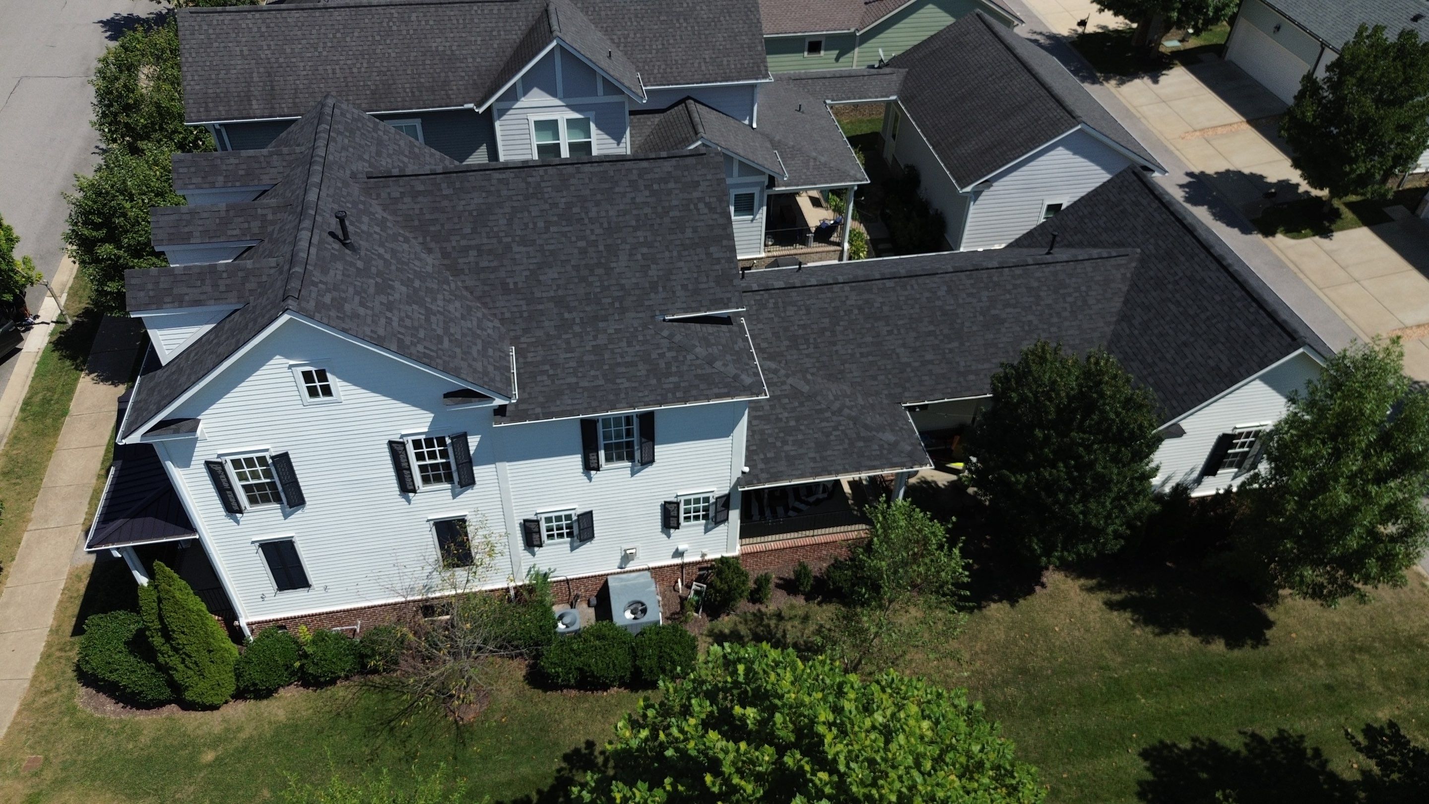 Architectural Shingle and Standing Seam Metal Roof Replacement in Franklin by Shinglesmiths Roofing