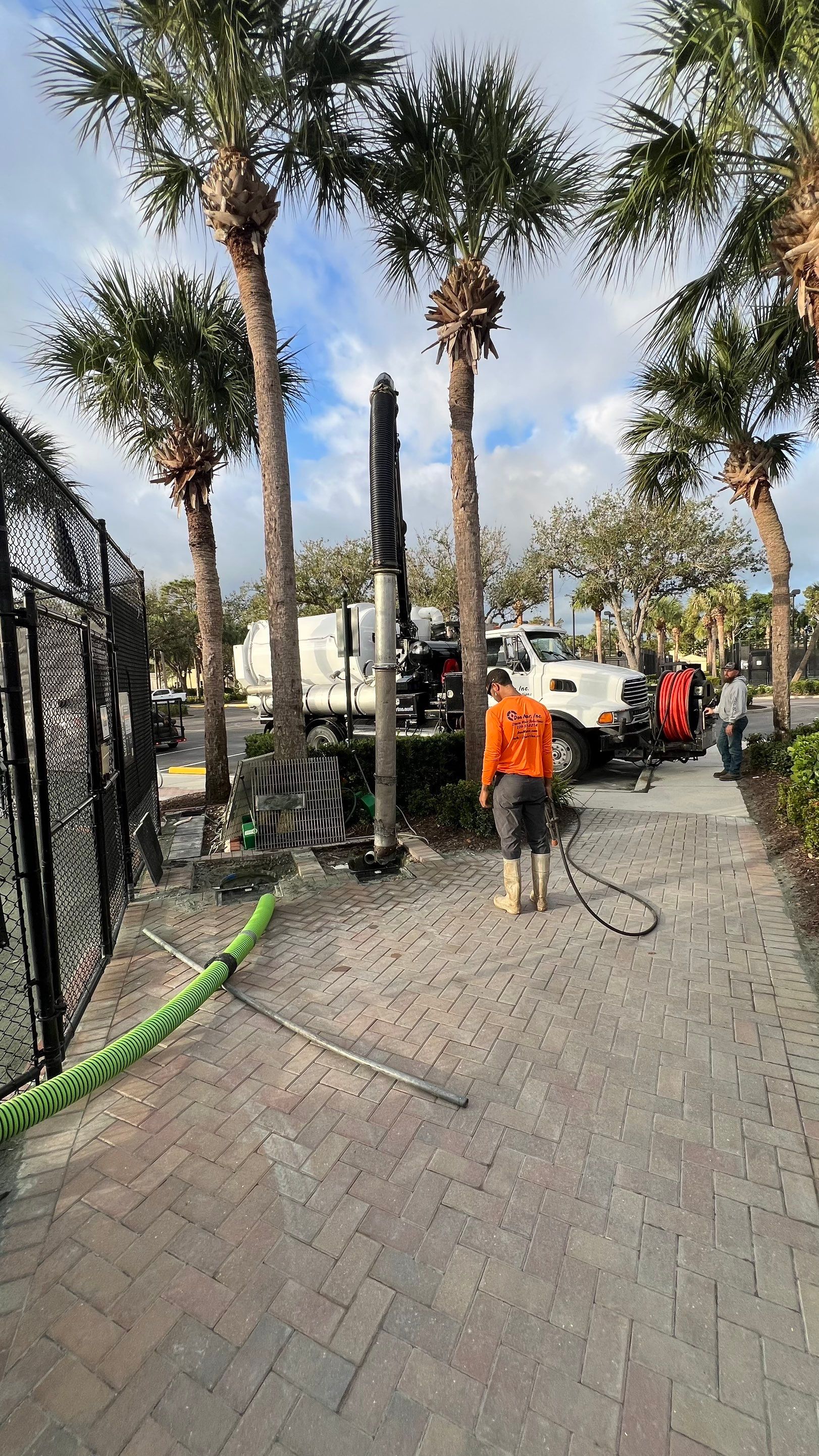 Pelican Landing Tennis Court Catch Basin Cleaning by APS Power & Water