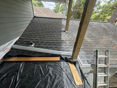 Roof Leak occurring at Sloped Roof-Flat Roof pitch break
