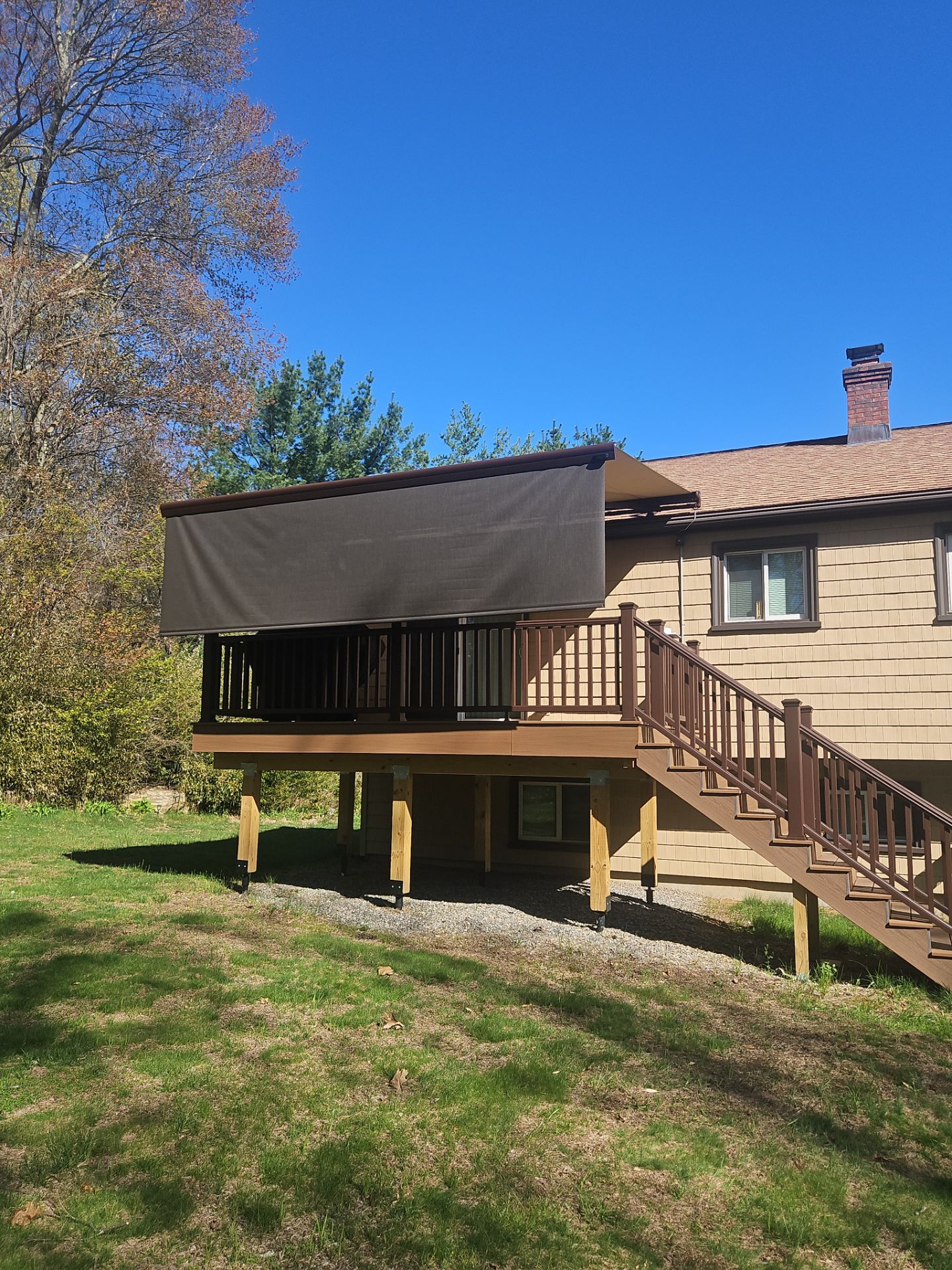 Retractable Awning Installation for Shade & Outdoor Comfort by DiGiorgi Roofing and Siding Inc