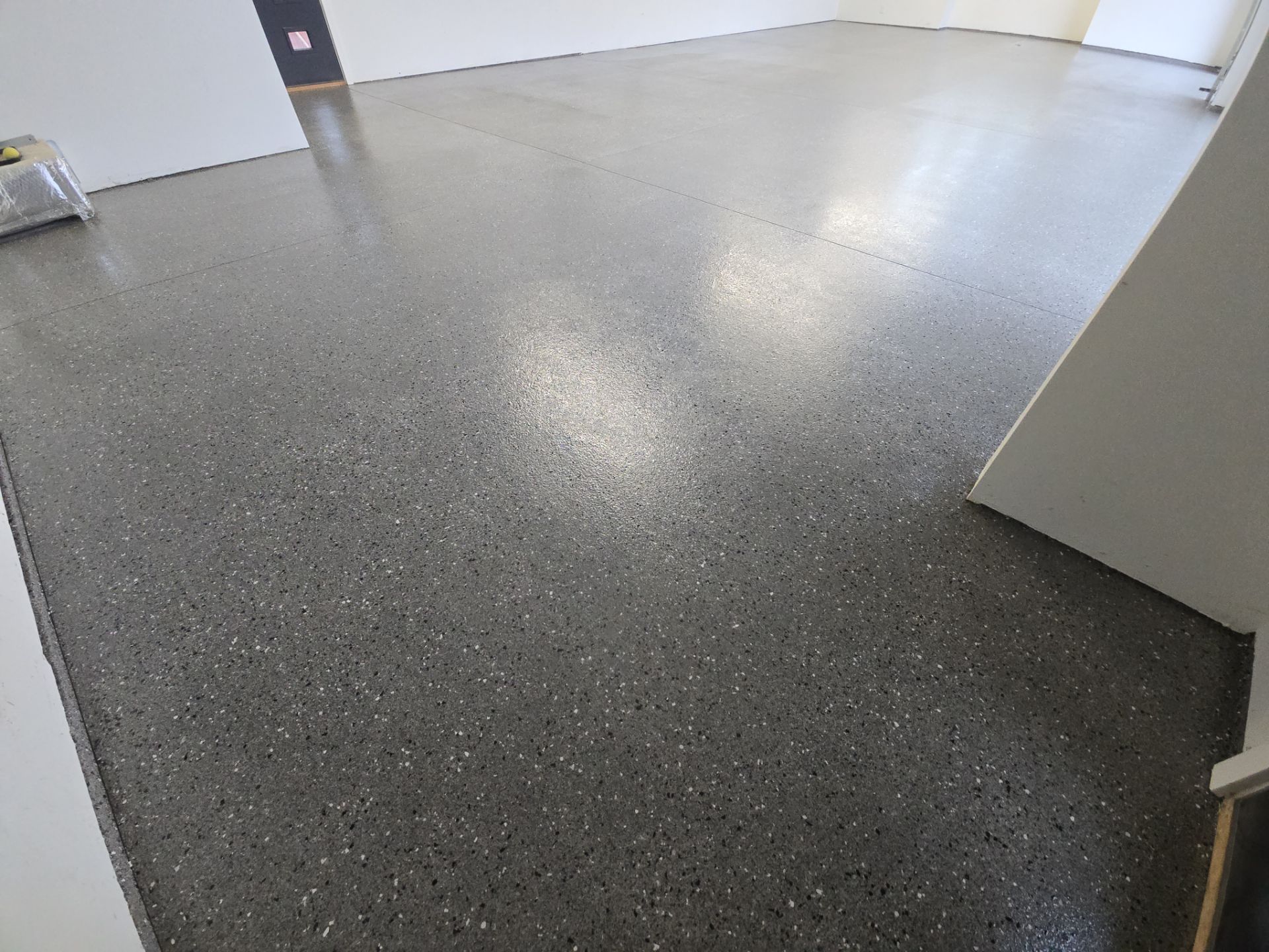 Garage Transformation using Slate Hybrid by Croc Coatings, LLC