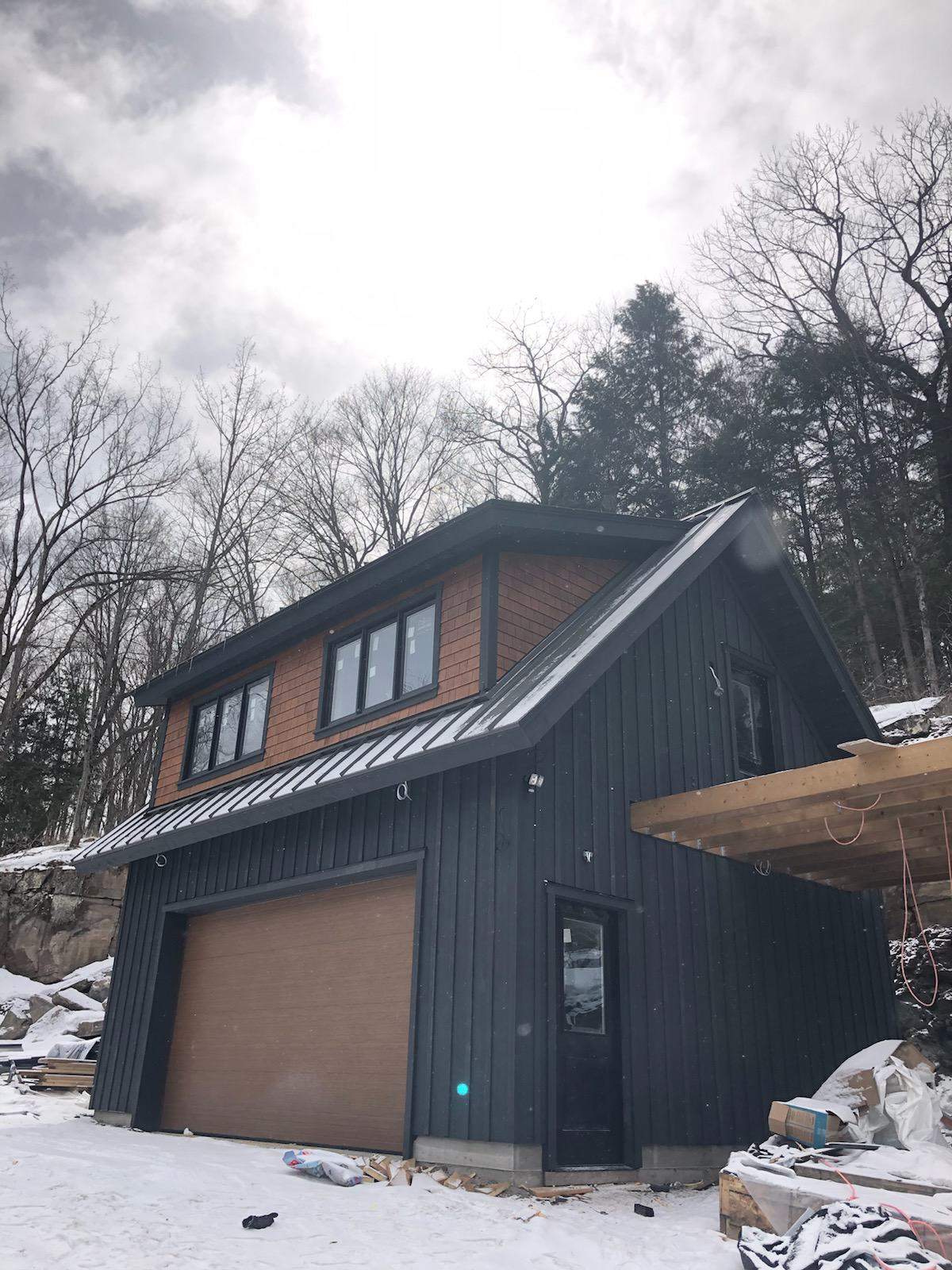 New Home Construction using 16" Standing Seam Panels by Jay Carter Roofing & Sheet Metal