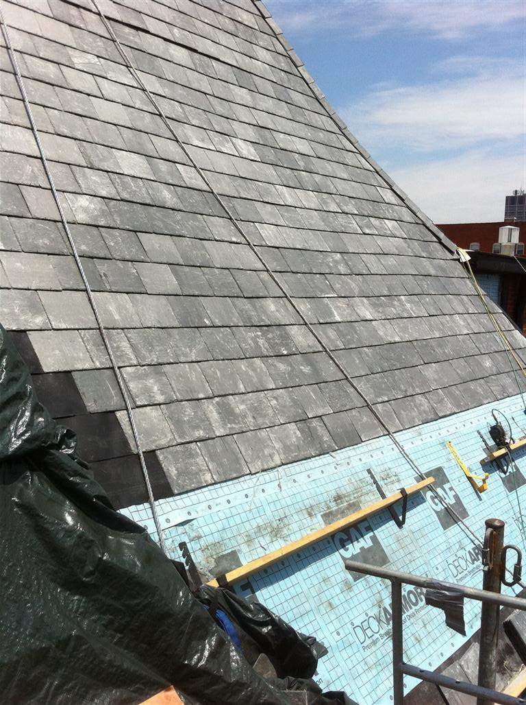 Historic Building ROOF REPLACEMNT with GAF TruSlate  on steep slop and Versico 60mil TPO on flat roof by Gorilla Exteriors Contracting, LLC