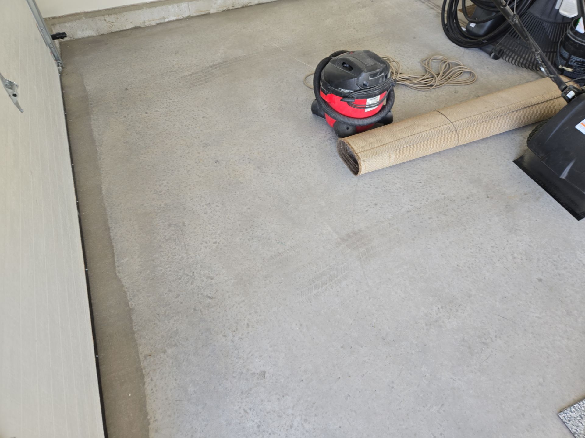 High-Gloss Epoxy Flake Garage Floor Coating in Brandon by Select Painting, Coatings & Garage Cabinets
