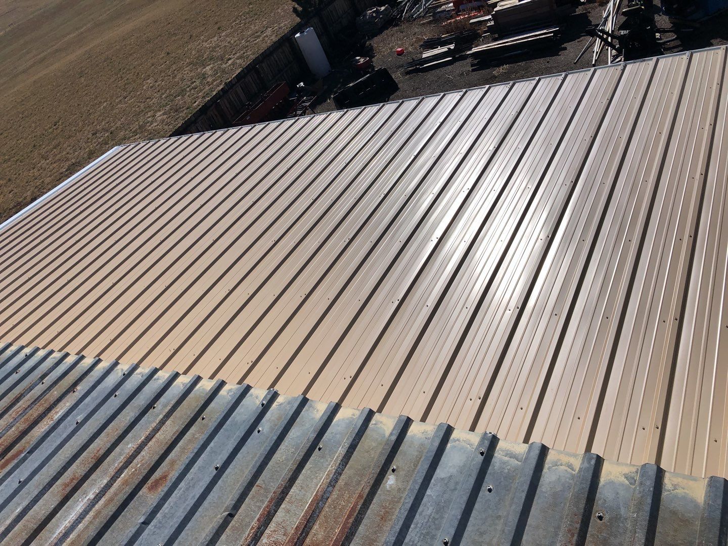 Residential Roofing Installation using Metal roofing by American Roofing & Construction LLC