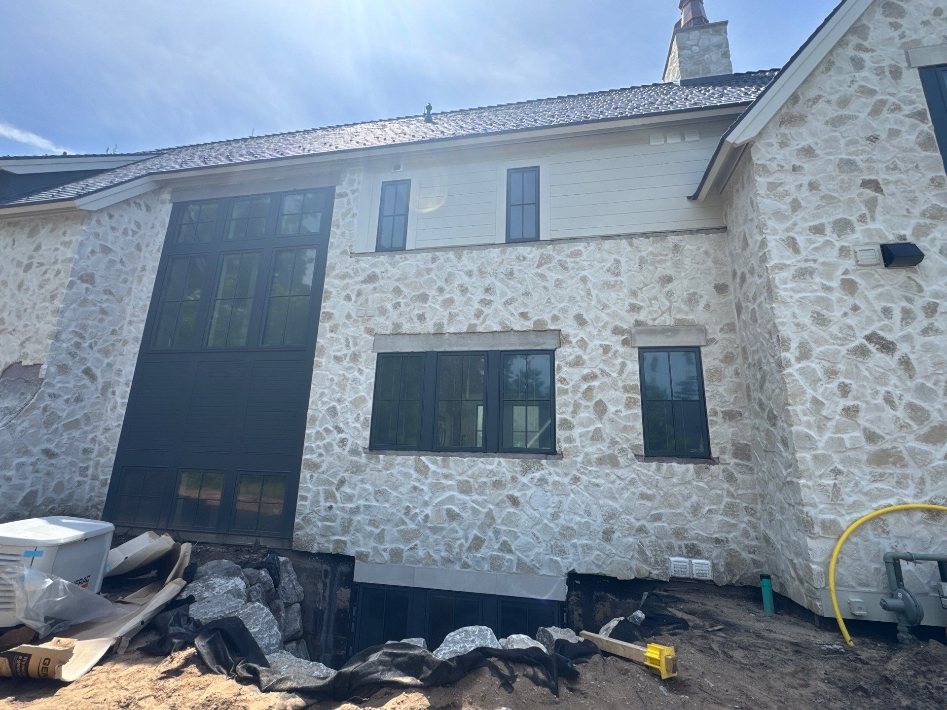 Half Round Gutter Installation for Petoskey Residence by Rainbow Seamless Systems
