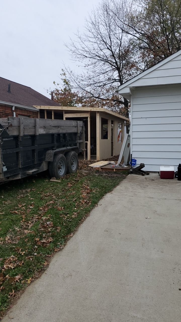 Tree Destroyed Patio Room by Absolute Roofing and Construction