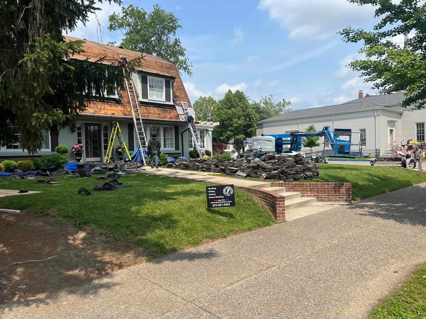 Slate removal/Cedar Shake replacement by Storm Contracting 