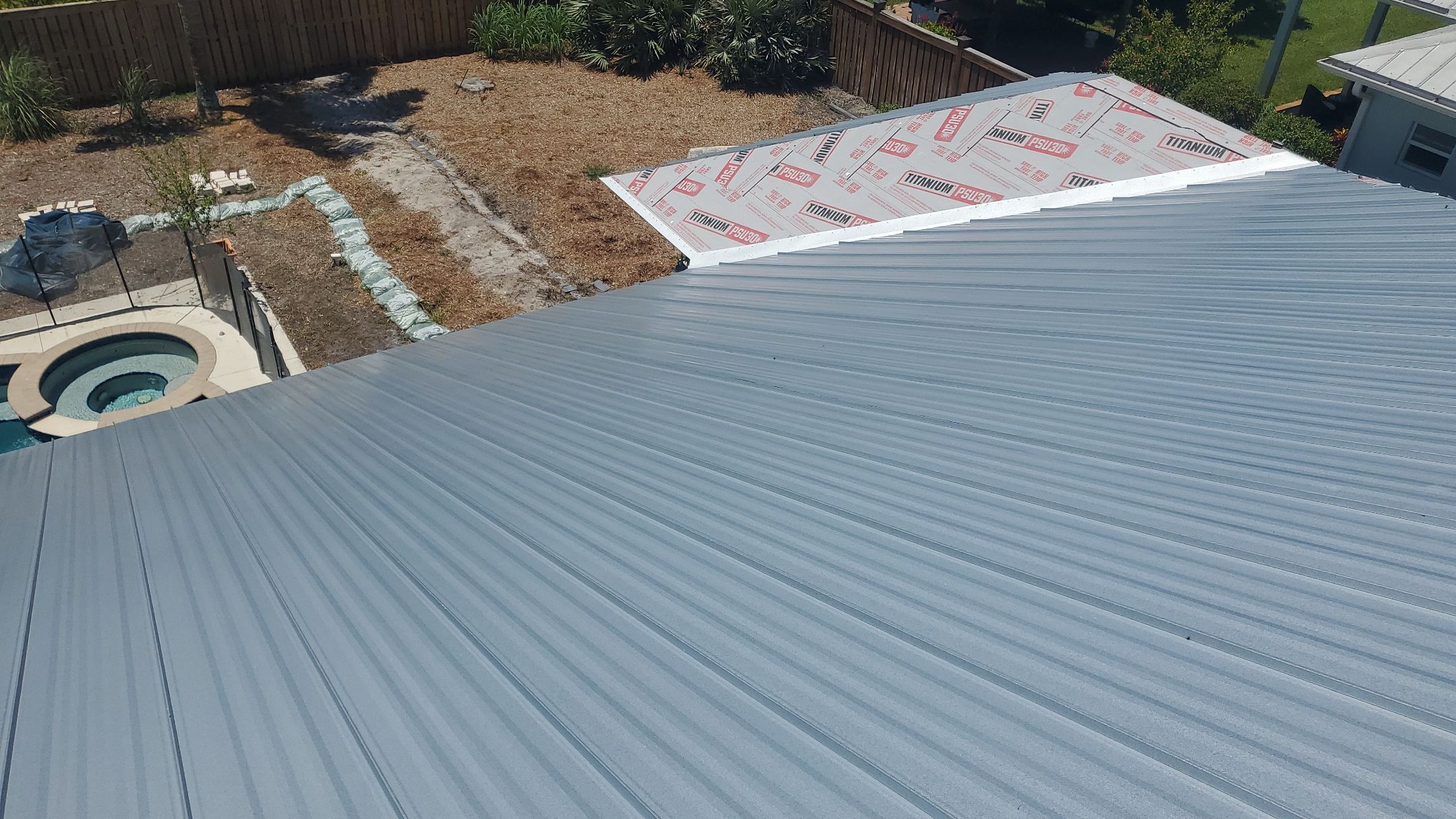 Standing Seam Metal Roof Replacement by Sailfish Roofing