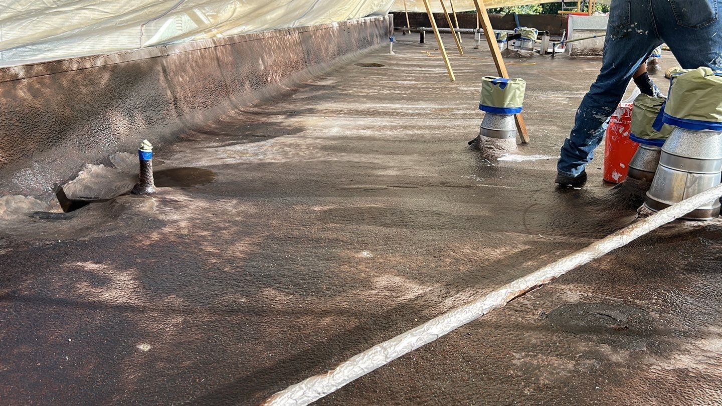 Foam Refurbish using Conklin Benchmark/PUMA XL coatings and spray foam; Also metal roofing around parapet wall by Straight Edge Roofing Inc