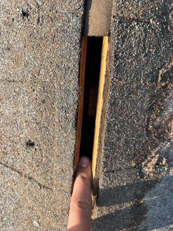 Residential Roofing Repair using Ridge vent replacement by Nitro Roofing and Construction