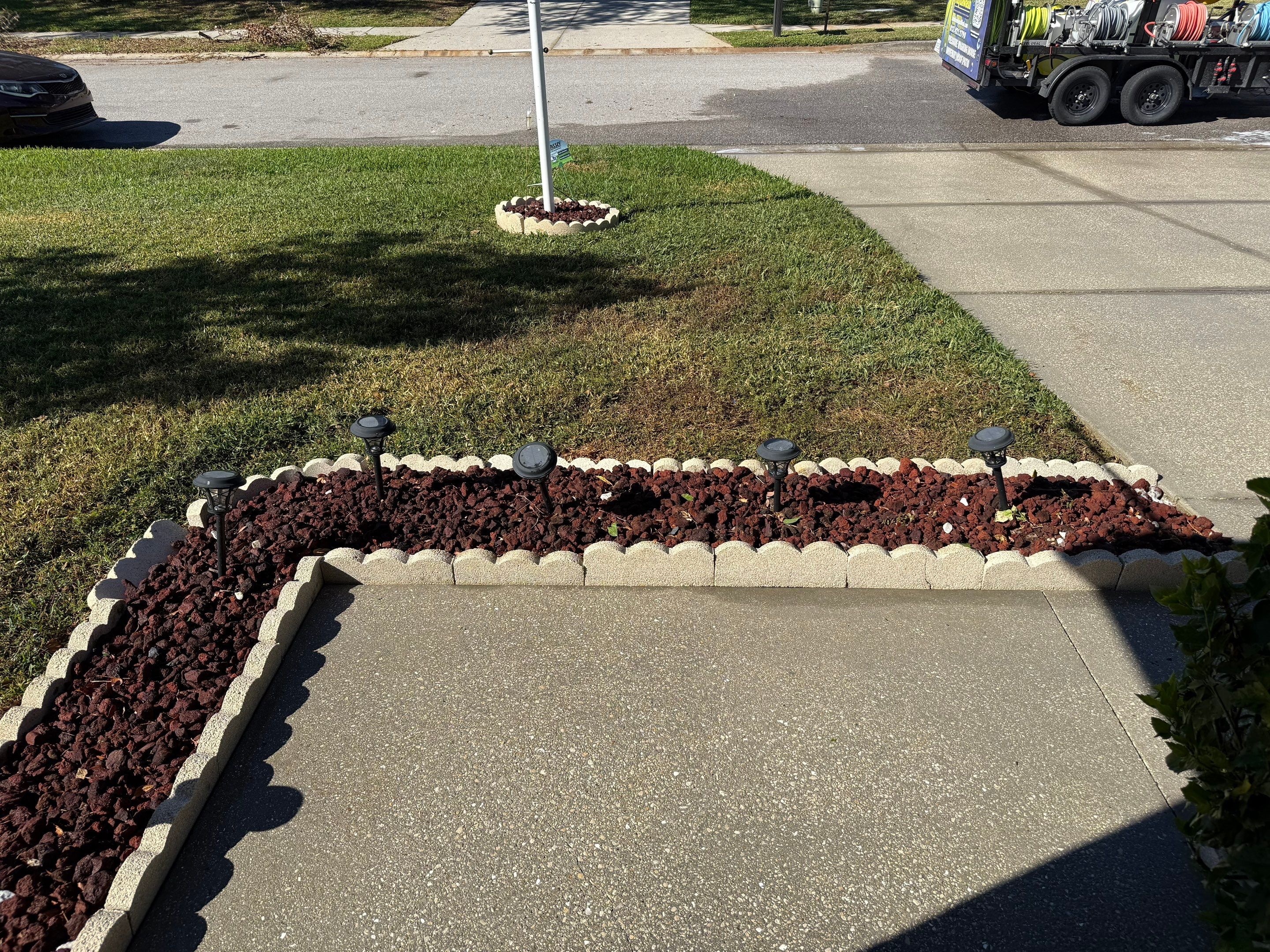 Concrete Driveway, Decorative Flowerbed Curbing & Front House Wash in Heather Glen, Palmetto, FL | Sunshine AquaWash by Sunshine AquaWash