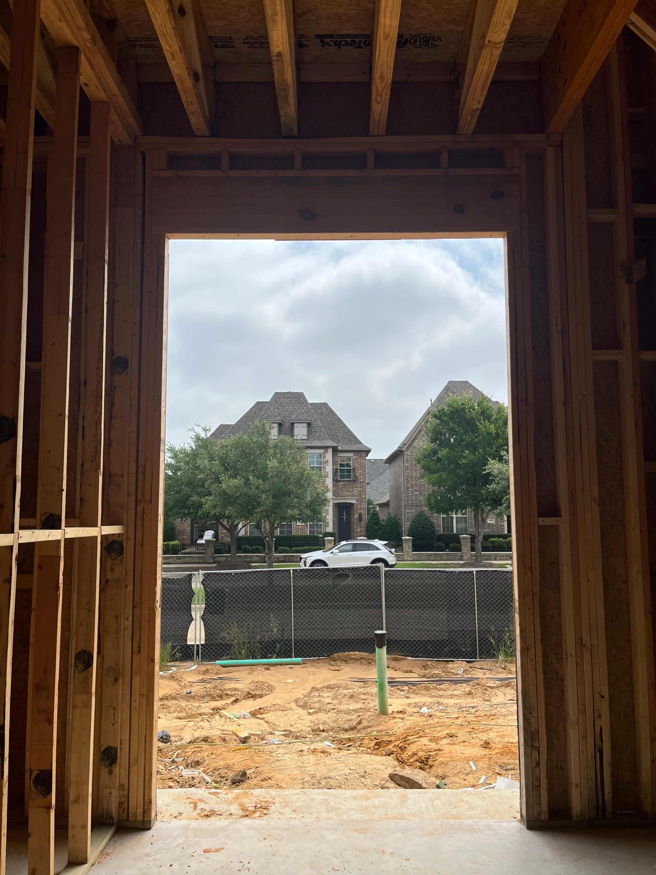 Custom Arched Entry Door Installation and Finishing in Southlake by Solara Custom Living
