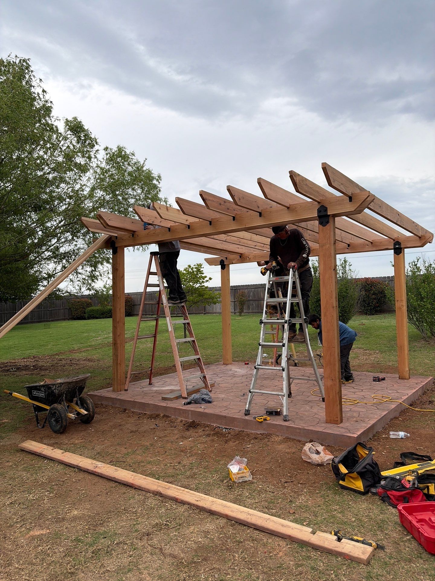 Stamped Concrete & Custom Pergola Build by Clays Services Inc