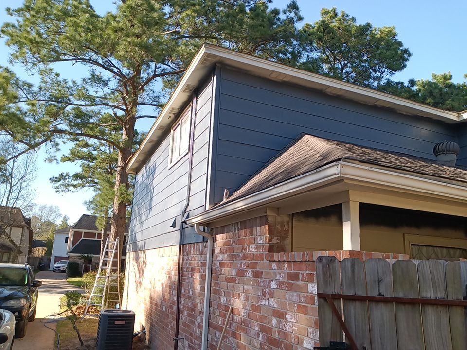 Interior and exterior painting project by Roof Concepts Construction