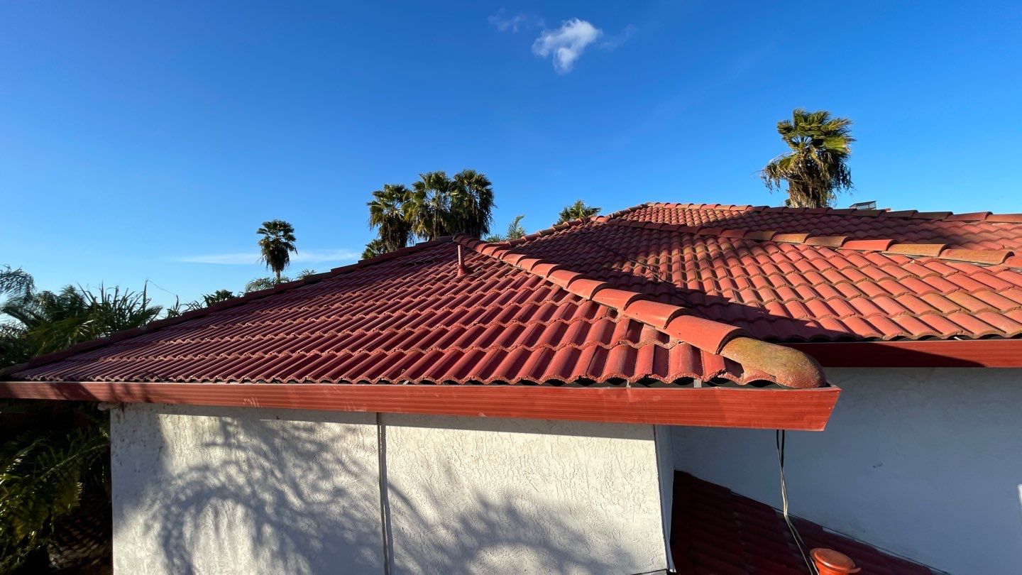 Tile refurbish project using existing tiles and replaced underlayment and battens by Straight Edge Roofing Inc