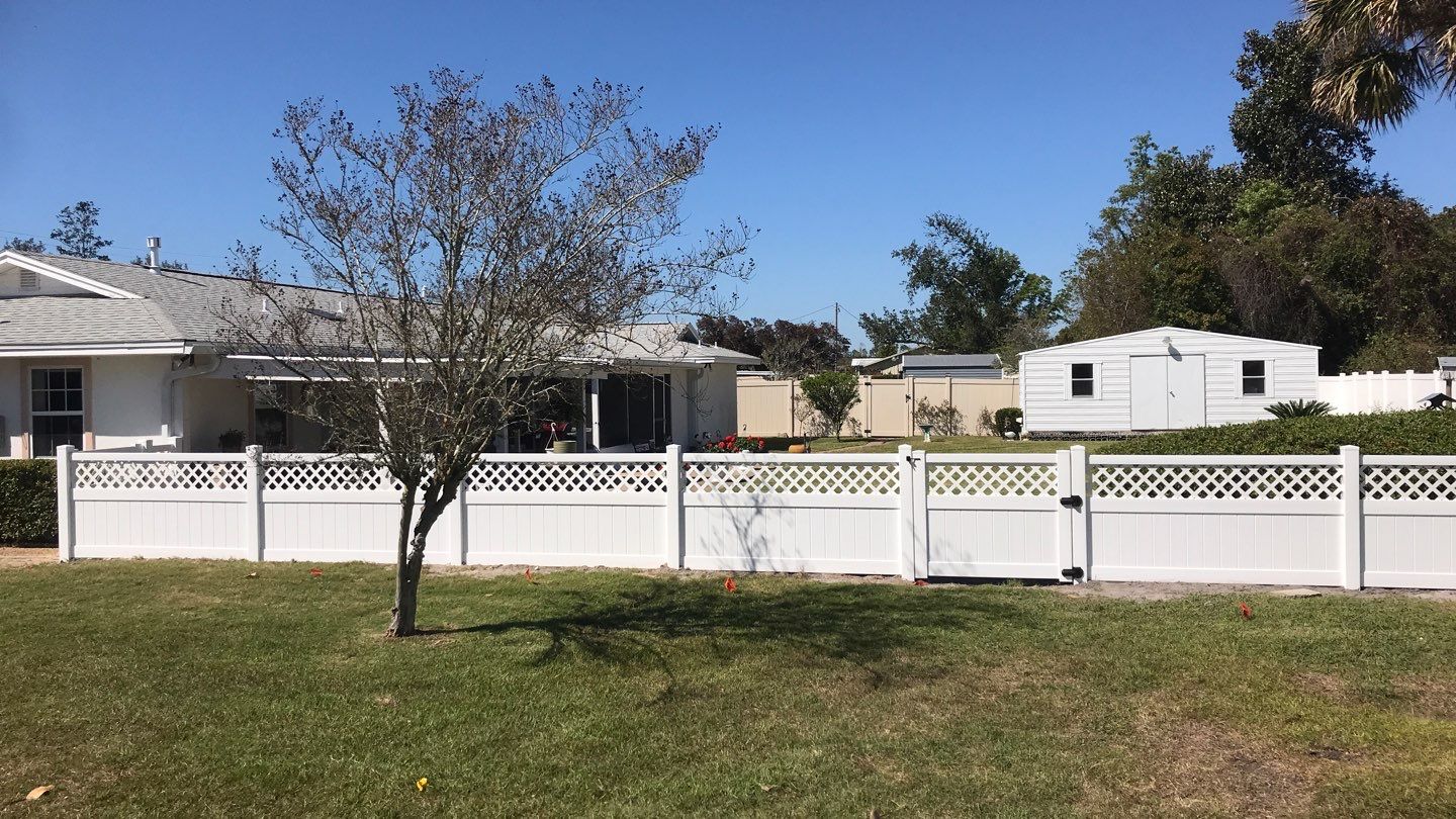 Fence Installation using White Vinyl by Hip Square Fence Inc.