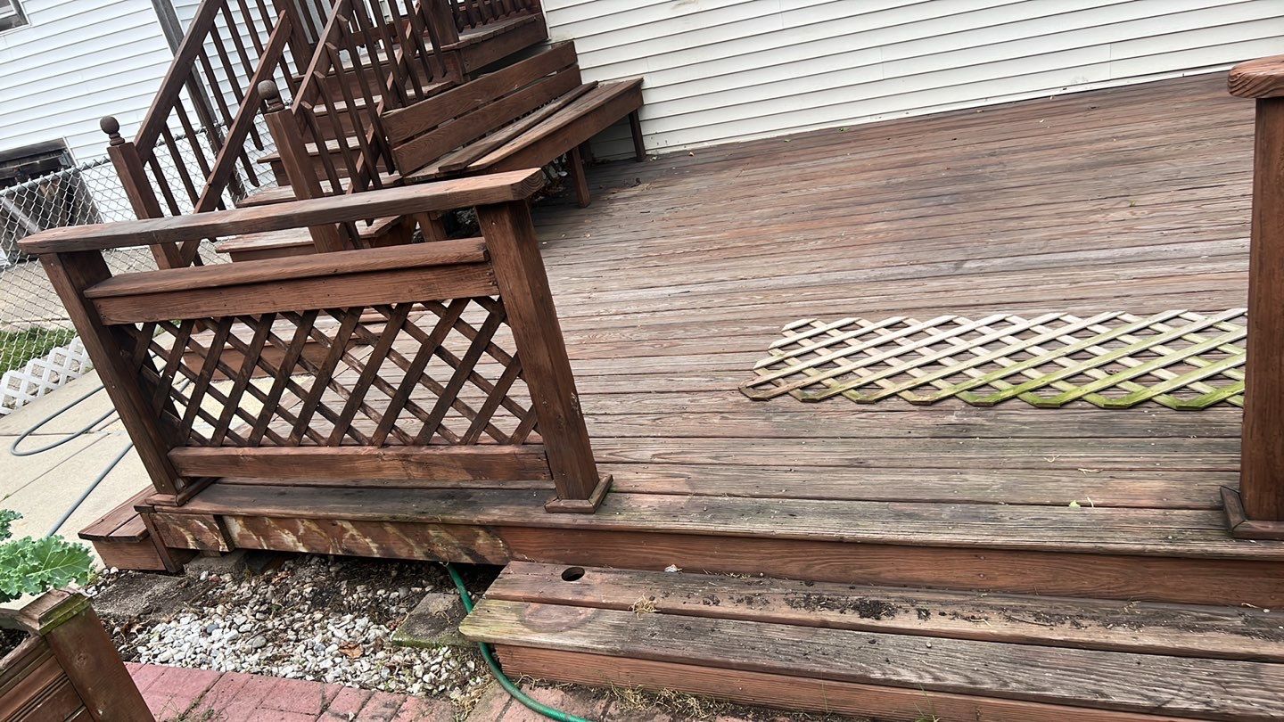 Wood cleaning and staining using Armstrong cloark oil stain by Northern Power Washing LLC.