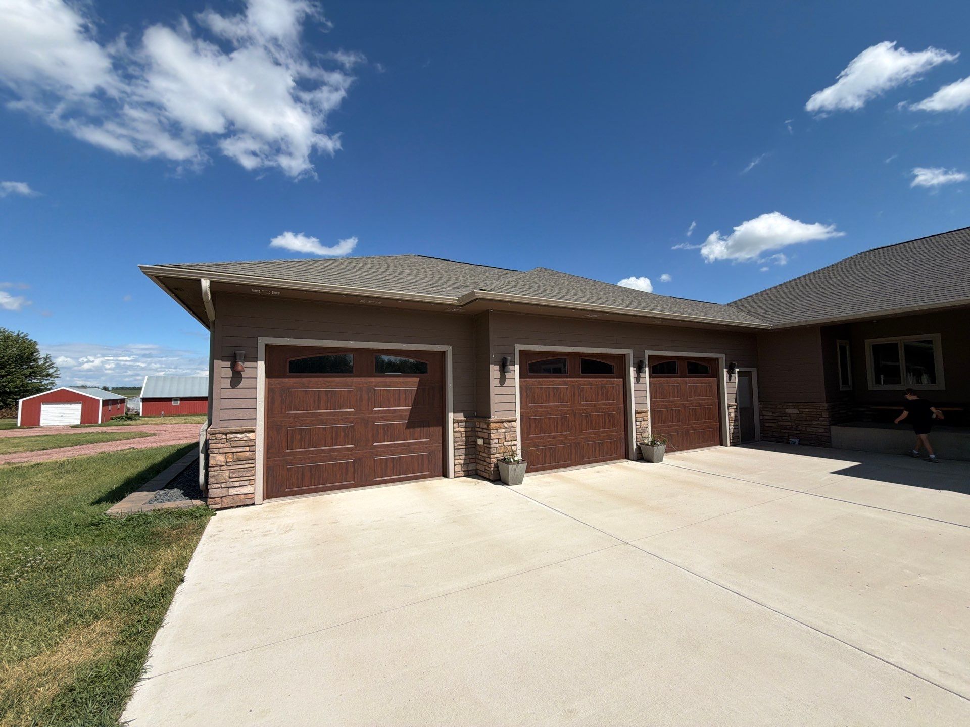 Full Exterior Siding Paint Restoration and Refresh in Garretson by Select Painting, Coatings & Garage Cabinets