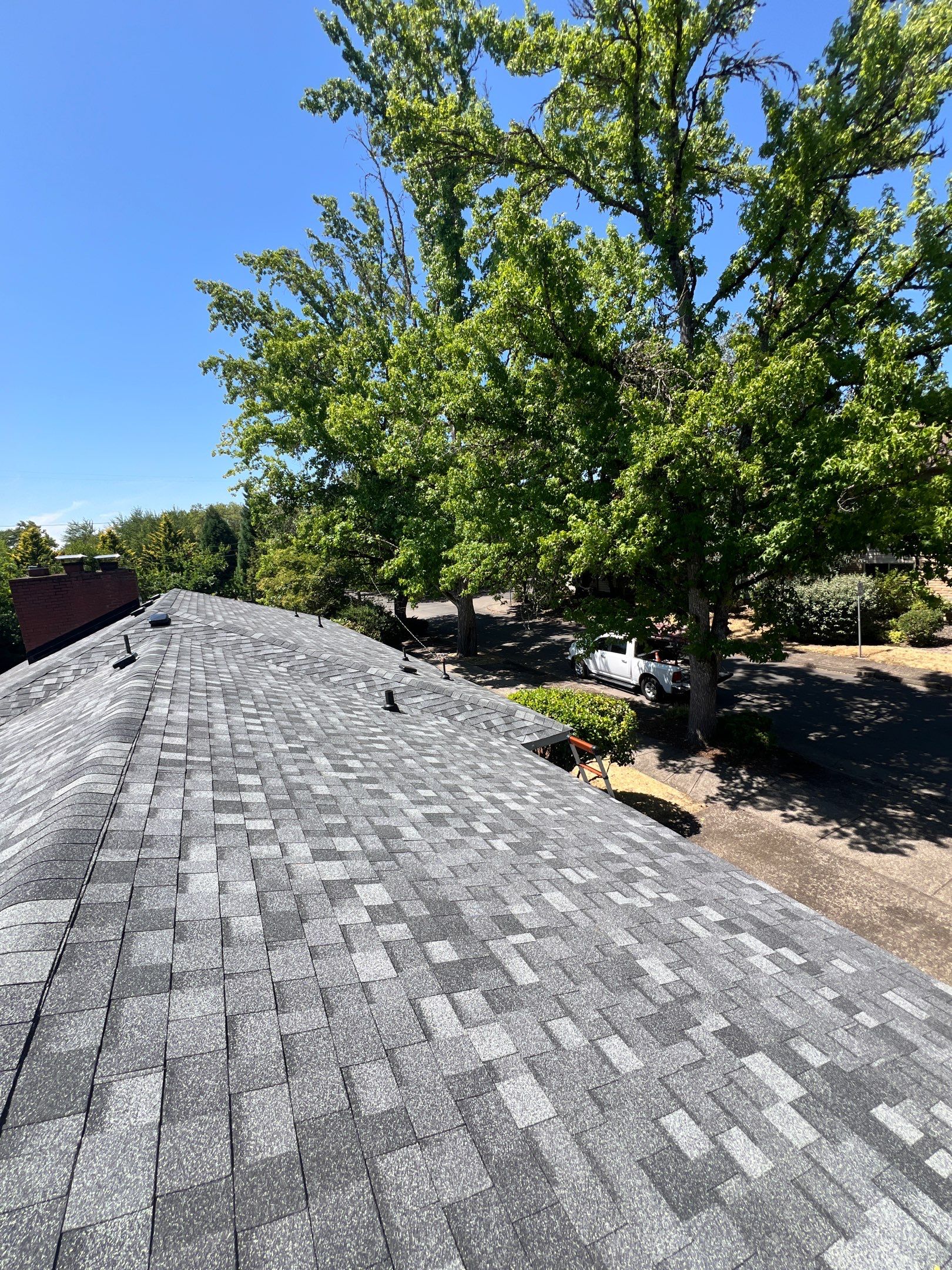 Summit Grey Residential Roofing Installation using IKO Dynasty by Orezona Building & Roofing Company, Inc.