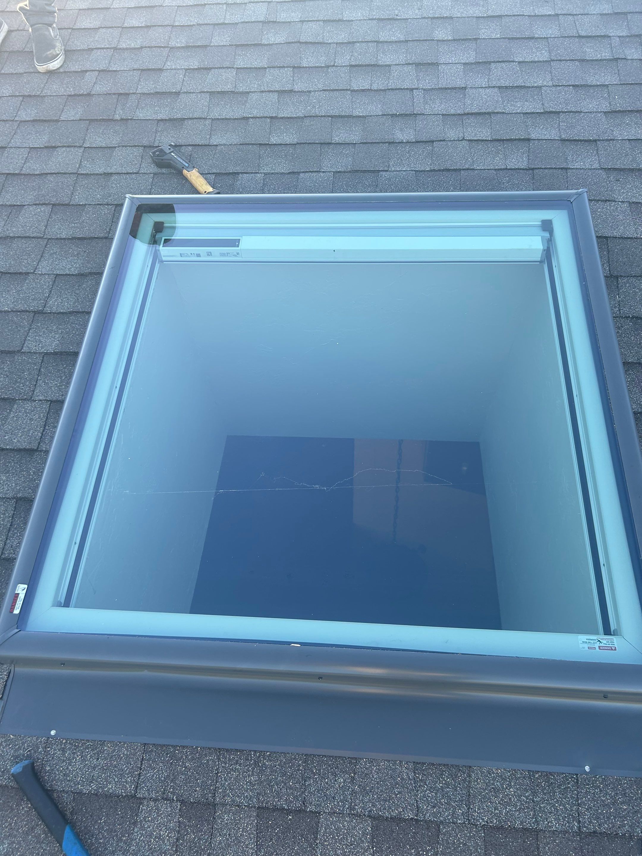Roof Replacement and Skylight Replacement in Yukon by McCann's Roofing and Construction