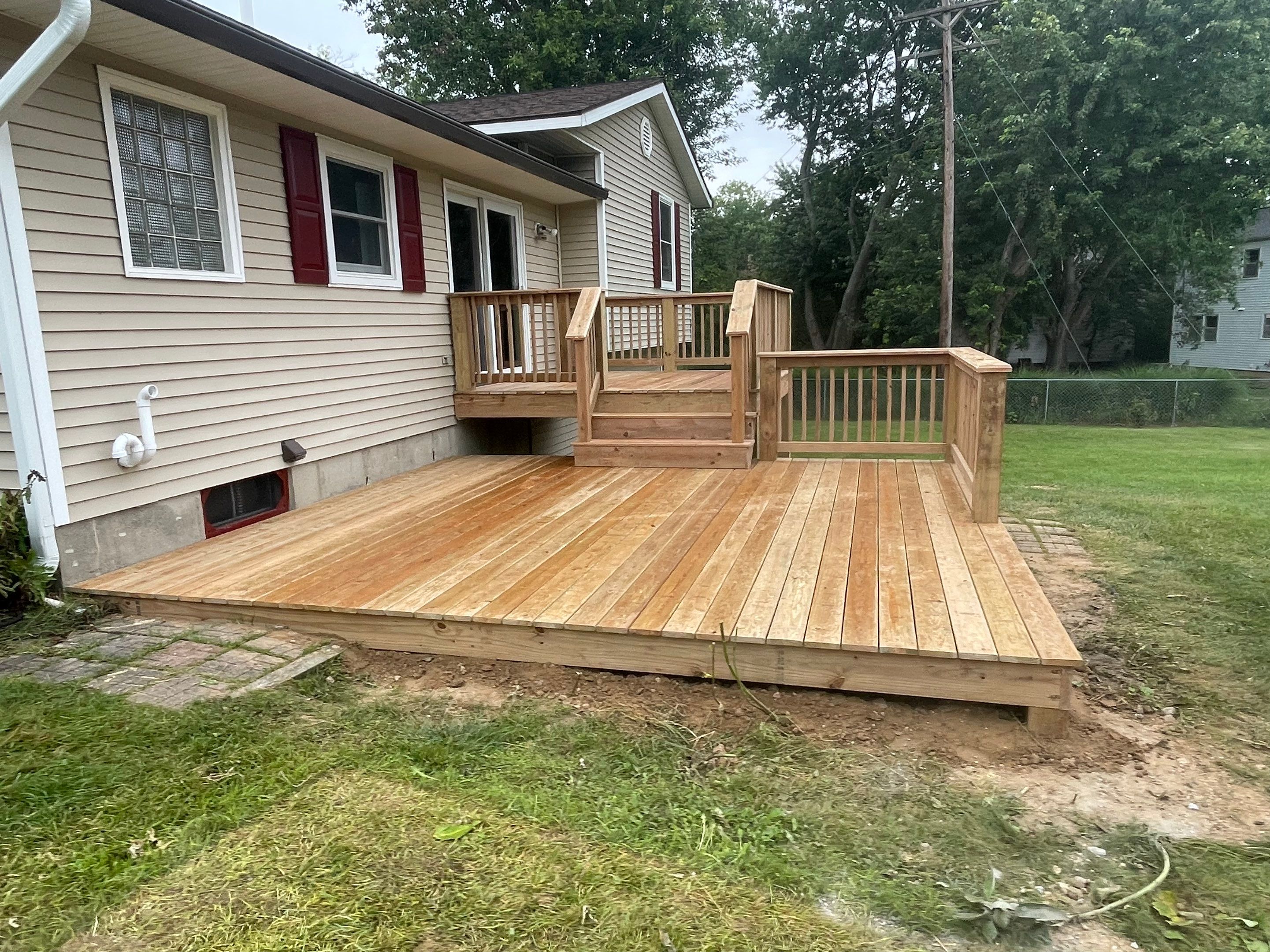 Deck Installation using Treated Lumber by Avalon Roofing and Exteriors