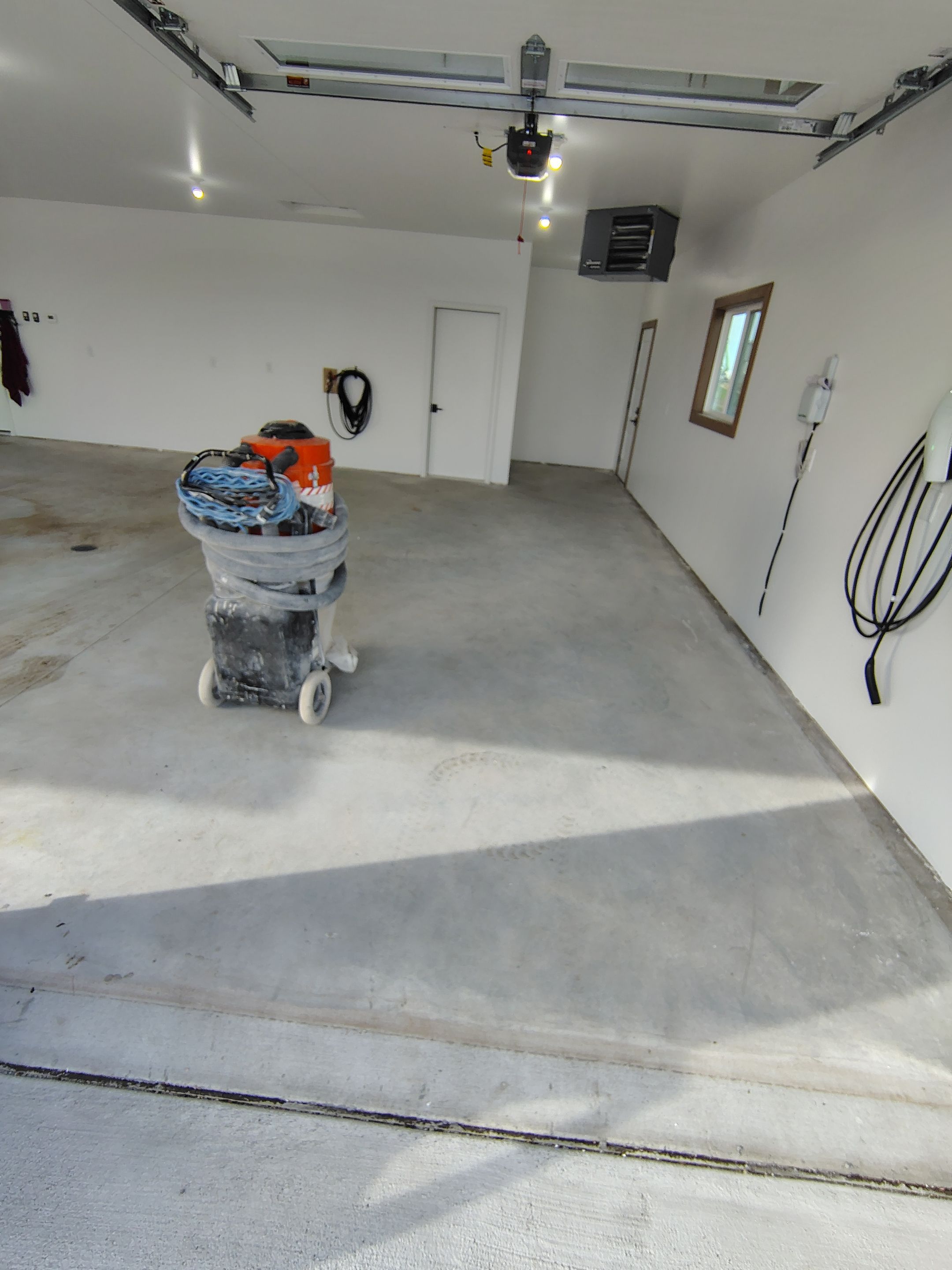 Gray and White Speckled Epoxy Garage Floor Coating in Tea by Select Painting, Coatings & Garage Cabinets