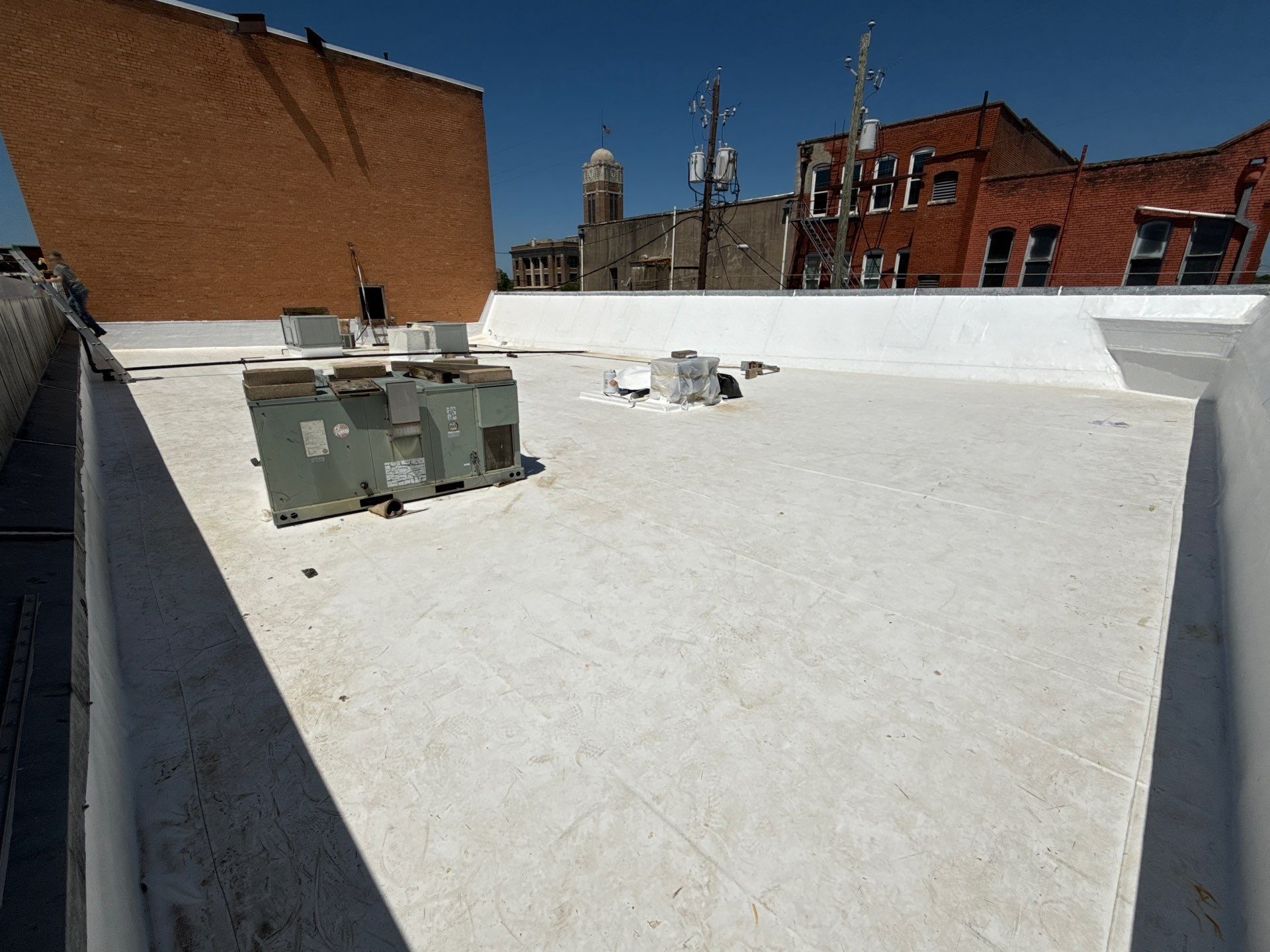 Commercial TPO Flat Roof in Cleburne, Tx by DT Roofing - Seth Wells