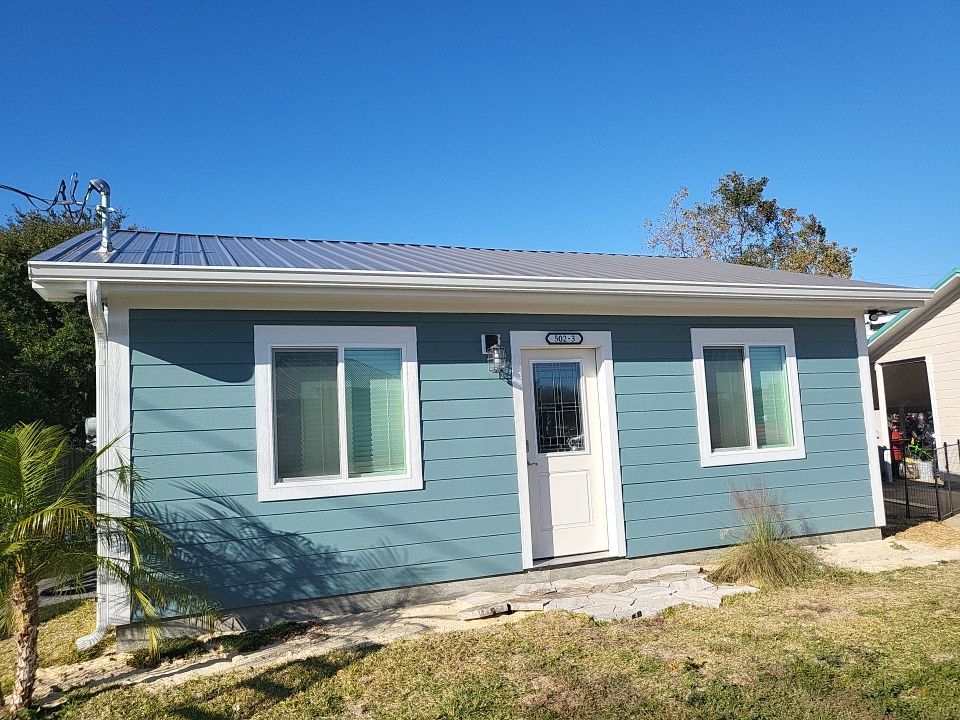 Gutter Installation using K-Style White Seamless Gutters by Gutter Professors
