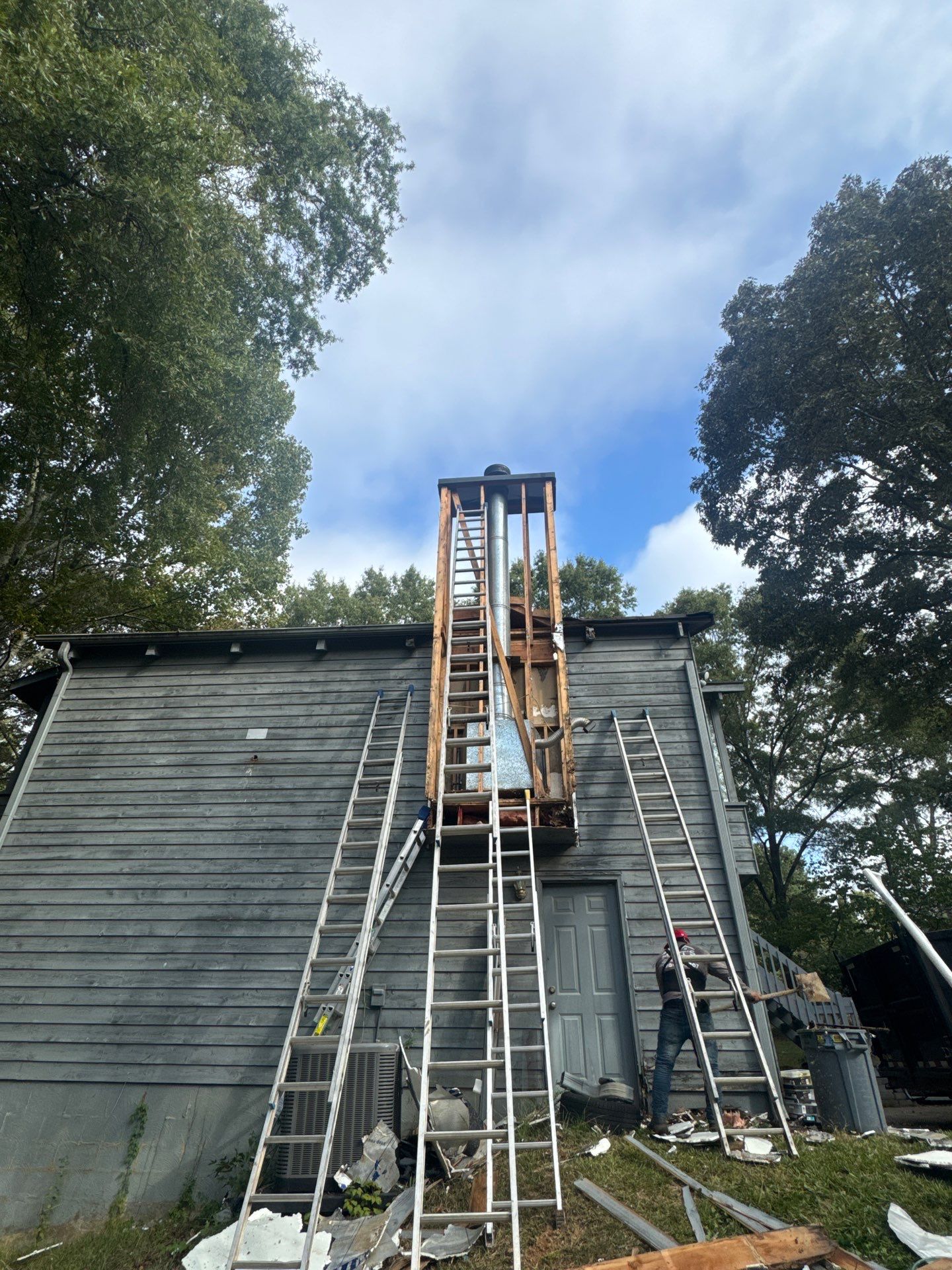 Chimney Chase Siding Replacement and Exterior Painting in Cartersville by Swift Home Renovations 