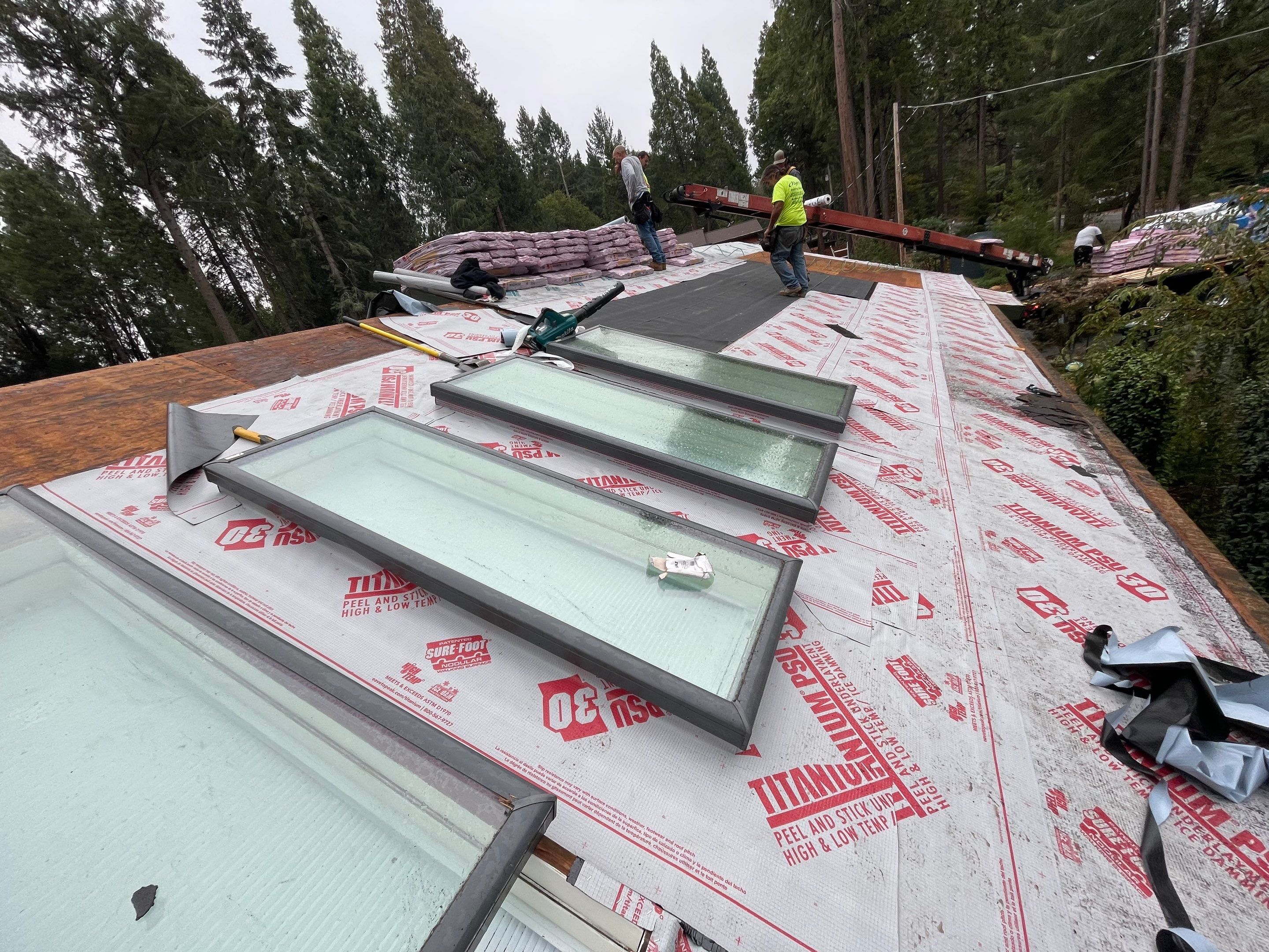 Residential Roofing Installation using Owens Corning Insulation by Byers Enterprises 