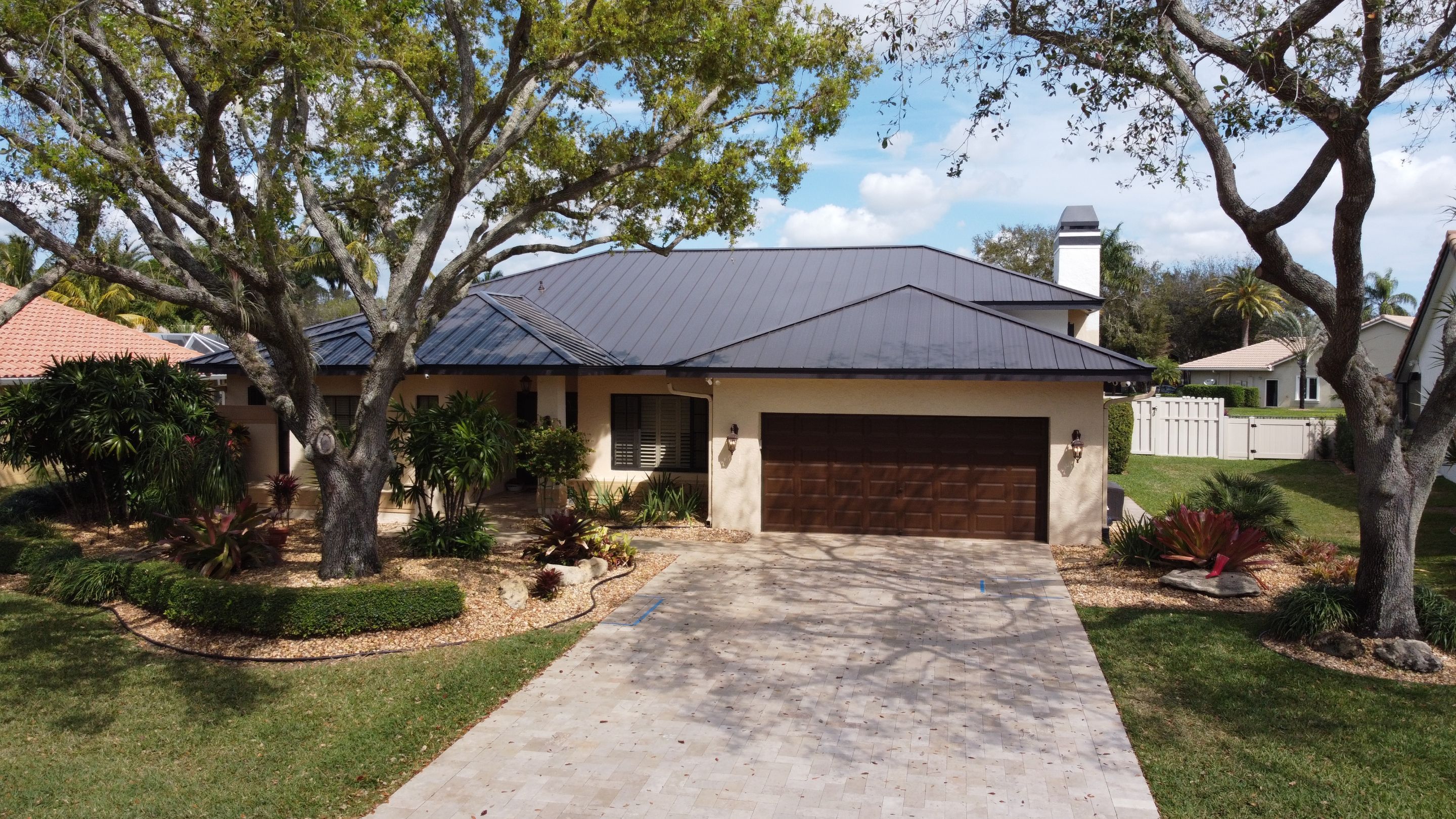 Residential Roofing Installation using 1" Nail strip metal roof by BLUES BROTHERS CONSTRUCTION CORP