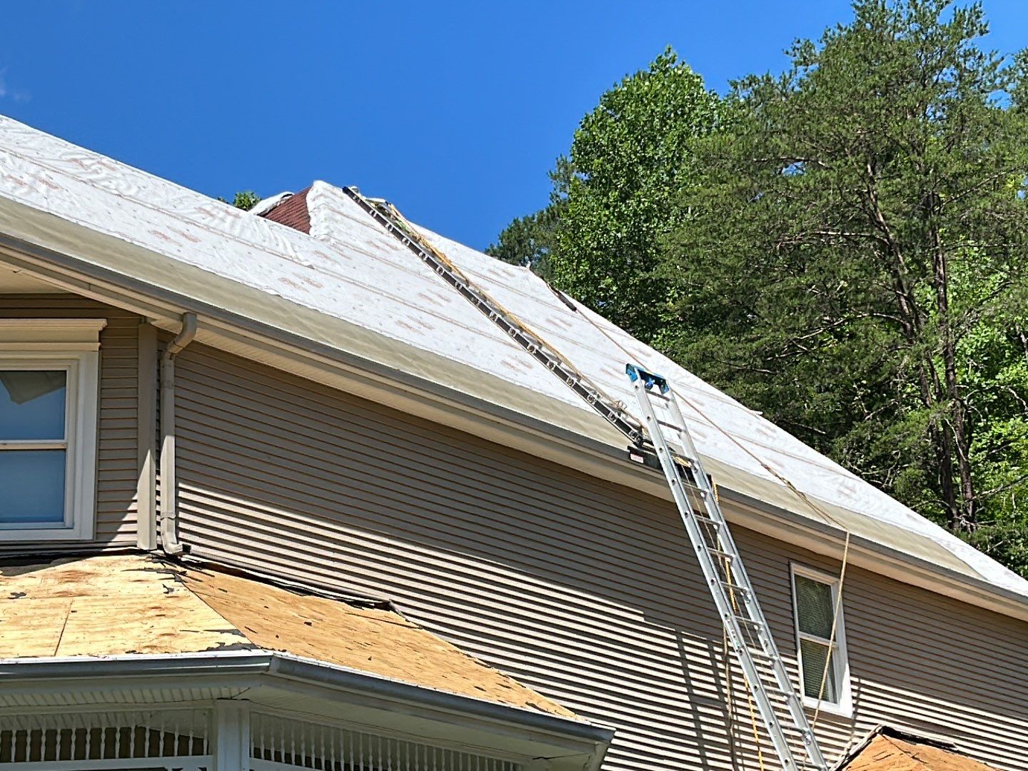 Residential Roofing Installation using Performance Shingles by Mr. Roofer