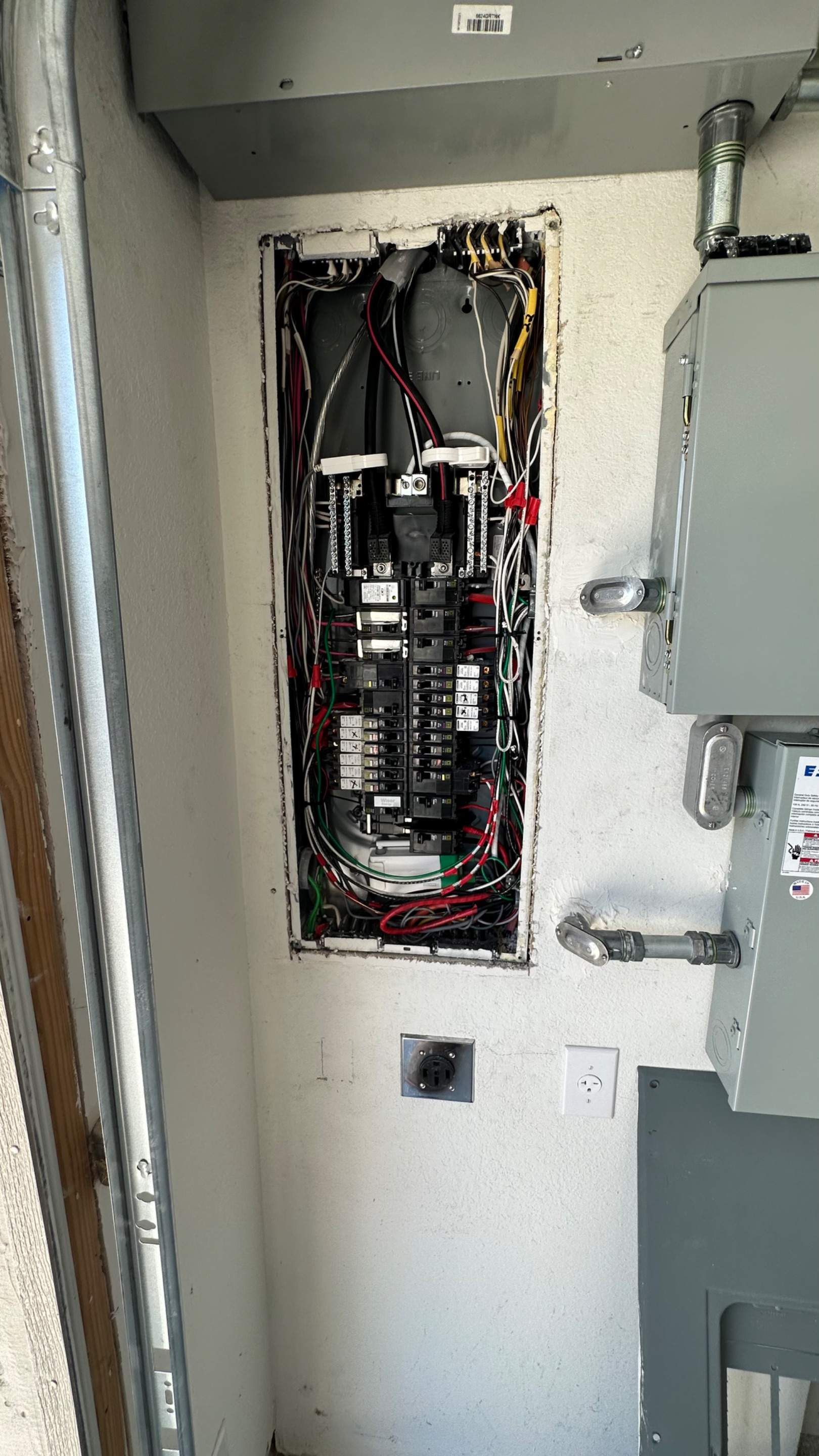 Tesla Wall Connector. Can lights. Spa disconnect. Exterior Outlets.  by Get Stoked Renovations